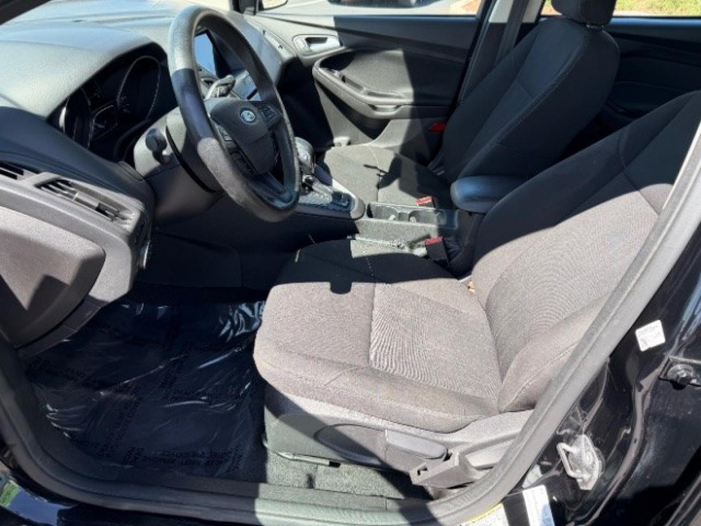 2017 Shadow Black /Charcoal Black Ford Focus SEL (1FADP3M26HL) with an 2L I-4 gasoline direct injection engine, Automatic transmission, located at 1865 East Red Hills Pkwy, St. George, 84770, (435) 628-0023, 37.120850, -113.543640 - We specialize in helping ALL people get the best financing available. No matter your credit score, good, bad or none we can get you an amazing rate. Had a bankruptcy, divorce, or repossessions? We give you the green light to get your credit back on the road. Low down and affordable payments that fit- Photo#18