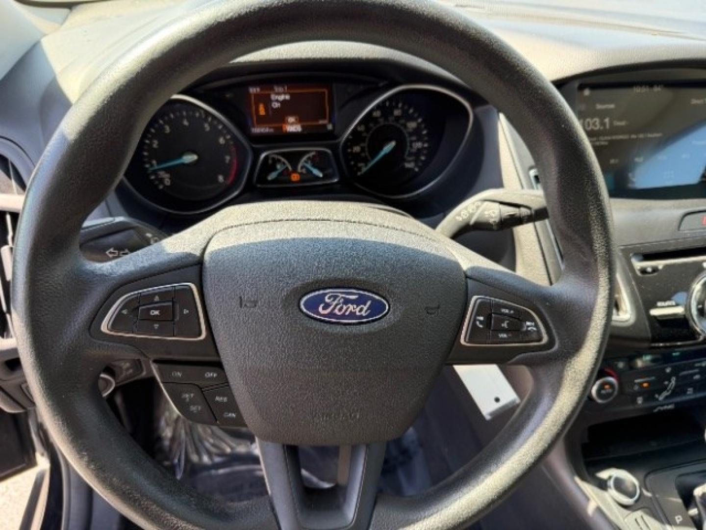2017 Shadow Black /Charcoal Black Ford Focus SEL (1FADP3M26HL) with an 2L I-4 gasoline direct injection engine, Automatic transmission, located at 1865 East Red Hills Pkwy, St. George, 84770, (435) 628-0023, 37.120850, -113.543640 - We specialize in helping ALL people get the best financing available. No matter your credit score, good, bad or none we can get you an amazing rate. Had a bankruptcy, divorce, or repossessions? We give you the green light to get your credit back on the road. Low down and affordable payments that fit- Photo#22