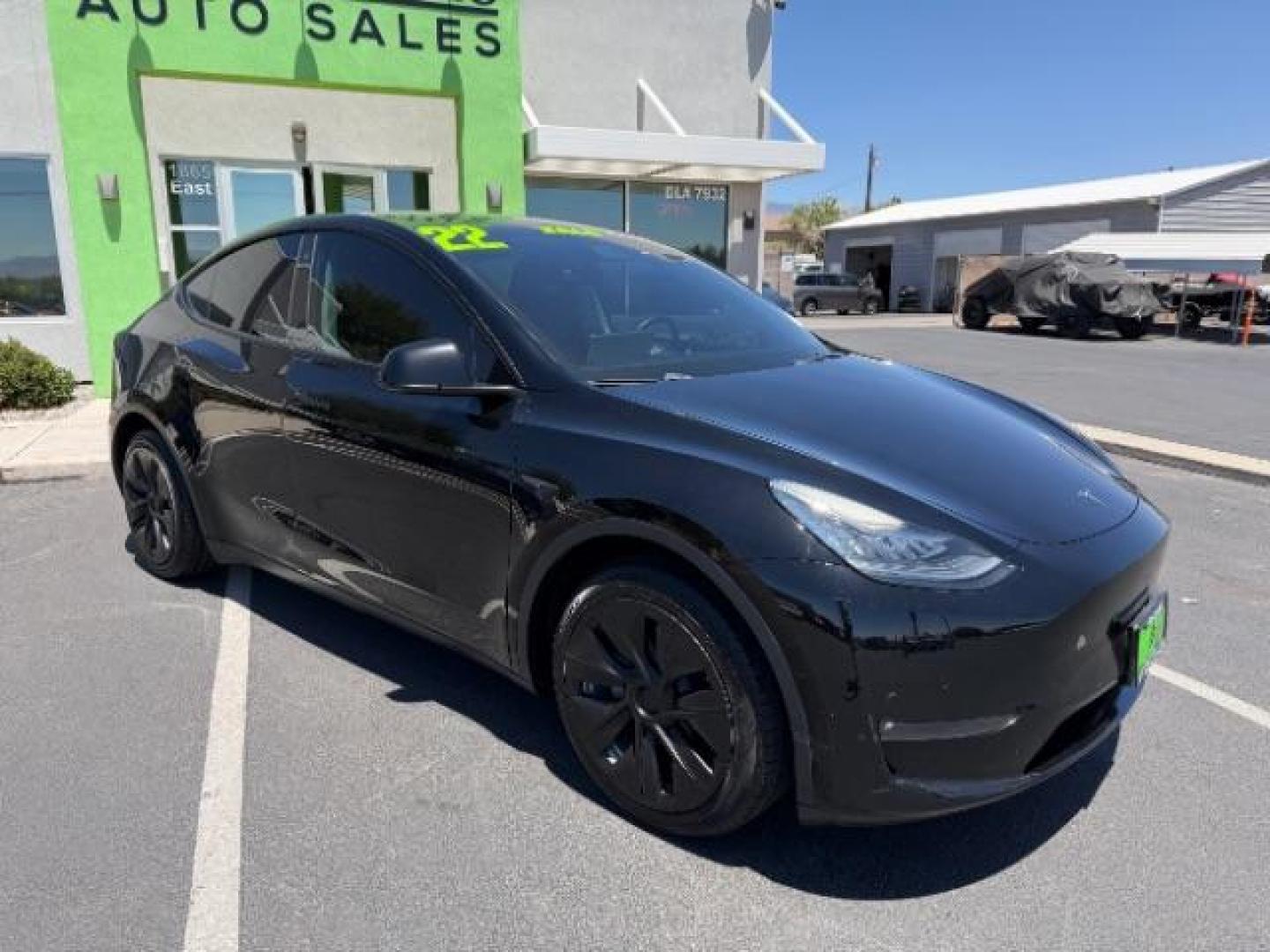2022 Solid Black /White/Black Tesla Model Y Long Range Dual Motor All-Wheel Drive (7SAYGAEE6NF) with an ELECTRIC engine, Electric transmission, located at 1865 East Red Hills Pkwy, St. George, 84770, (435) 628-0023, 37.120850, -113.543640 - Excellent Tesla Model Y Long Range All Wheel Drive. 3rd Row, 7 Seats HW3, Interior and exterior in great condition. Small scratches and dings as pictured. Every Tesla we sell has had cabin air filter replaced, radiator cleaned, fluids topped AND comes with a mobile charging kit! Battery is healthy- Photo#0
