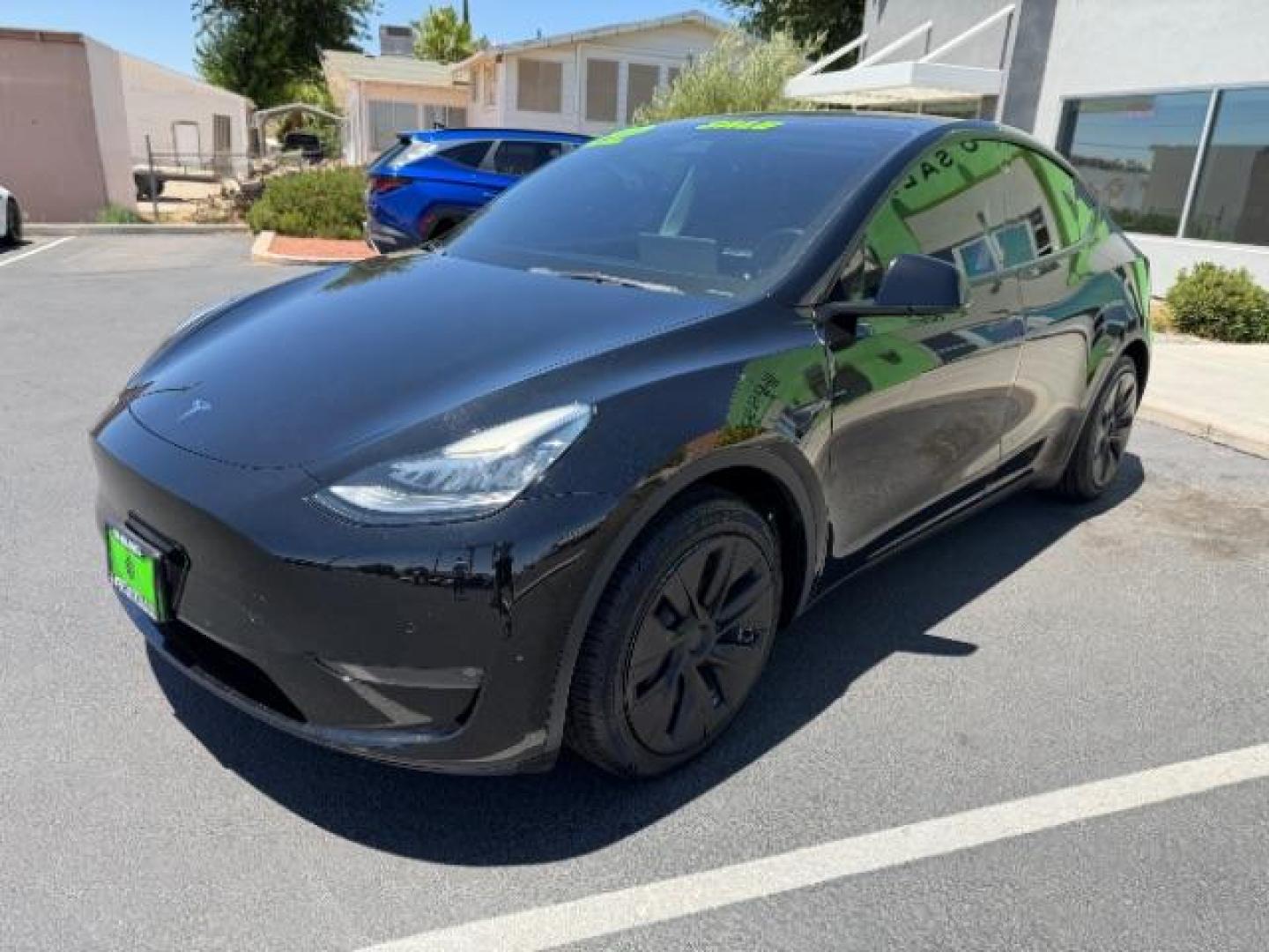 2022 Solid Black /White/Black Tesla Model Y Long Range Dual Motor All-Wheel Drive (7SAYGAEE6NF) with an ELECTRIC engine, Electric transmission, located at 1865 East Red Hills Pkwy, St. George, 84770, (435) 628-0023, 37.120850, -113.543640 - Excellent Tesla Model Y Long Range All Wheel Drive. 3rd Row, 7 Seats HW3, Interior and exterior in great condition. Small scratches and dings as pictured. Every Tesla we sell has had cabin air filter replaced, radiator cleaned, fluids topped AND comes with a mobile charging kit! Battery is healthy- Photo#2