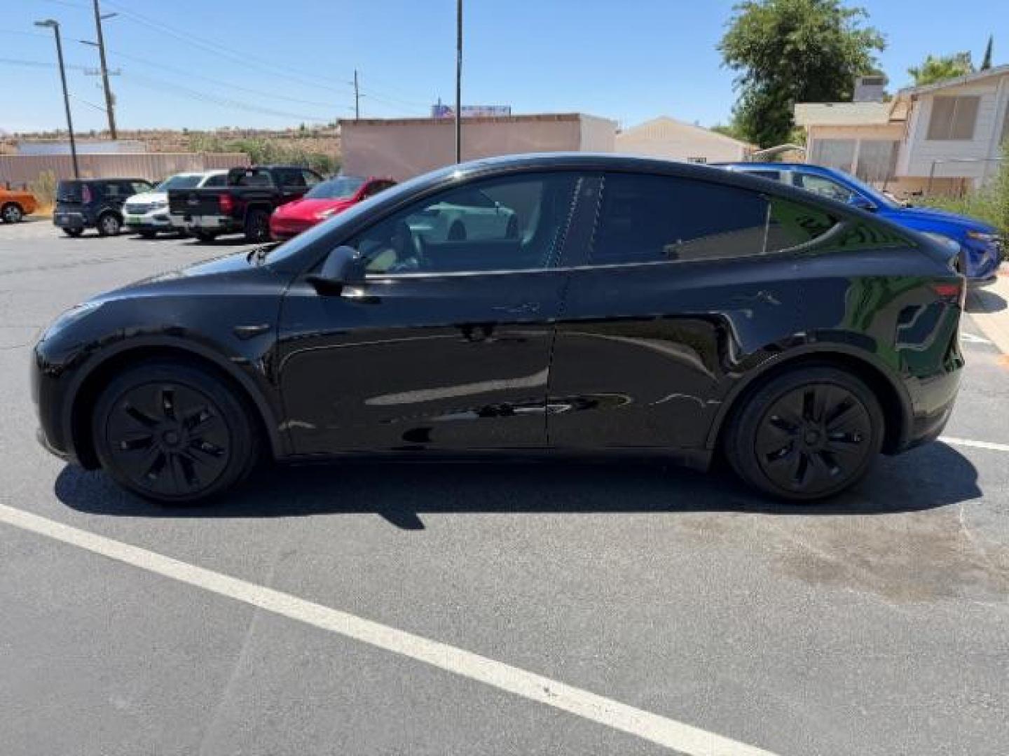 2022 Solid Black /White/Black Tesla Model Y Long Range Dual Motor All-Wheel Drive (7SAYGAEE6NF) with an ELECTRIC engine, Electric transmission, located at 1865 East Red Hills Pkwy, St. George, 84770, (435) 628-0023, 37.120850, -113.543640 - Excellent Tesla Model Y Long Range All Wheel Drive. 3rd Row, 7 Seats HW3, Interior and exterior in great condition. Small scratches and dings as pictured. Every Tesla we sell has had cabin air filter replaced, radiator cleaned, fluids topped AND comes with a mobile charging kit! Battery is healthy- Photo#3