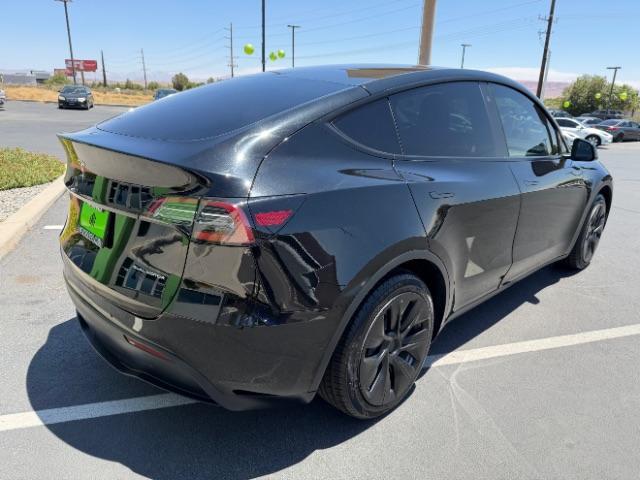 2022 Solid Black /White/Black Tesla Model Y Long Range Dual Motor All-Wheel Drive (7SAYGAEE6NF) with an ELECTRIC engine, Electric transmission, located at 1865 East Red Hills Pkwy, St. George, 84770, (435) 628-0023, 37.120850, -113.543640 - Excellent Tesla Model Y Long Range All Wheel Drive. 3rd Row, 7 Seats HW3, Interior and exterior in great condition. Small scratches and dings as pictured. Every Tesla we sell has had cabin air filter replaced, radiator cleaned, fluids topped AND comes with a mobile charging kit! Battery is healthy - Photo#4