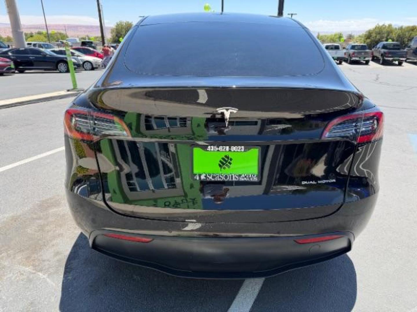 2022 Solid Black /White/Black Tesla Model Y Long Range Dual Motor All-Wheel Drive (7SAYGAEE6NF) with an ELECTRIC engine, Electric transmission, located at 1865 East Red Hills Pkwy, St. George, 84770, (435) 628-0023, 37.120850, -113.543640 - Excellent Tesla Model Y Long Range All Wheel Drive. 3rd Row, 7 Seats HW3, Interior and exterior in great condition. Small scratches and dings as pictured. Every Tesla we sell has had cabin air filter replaced, radiator cleaned, fluids topped AND comes with a mobile charging kit! Battery is healthy- Photo#5