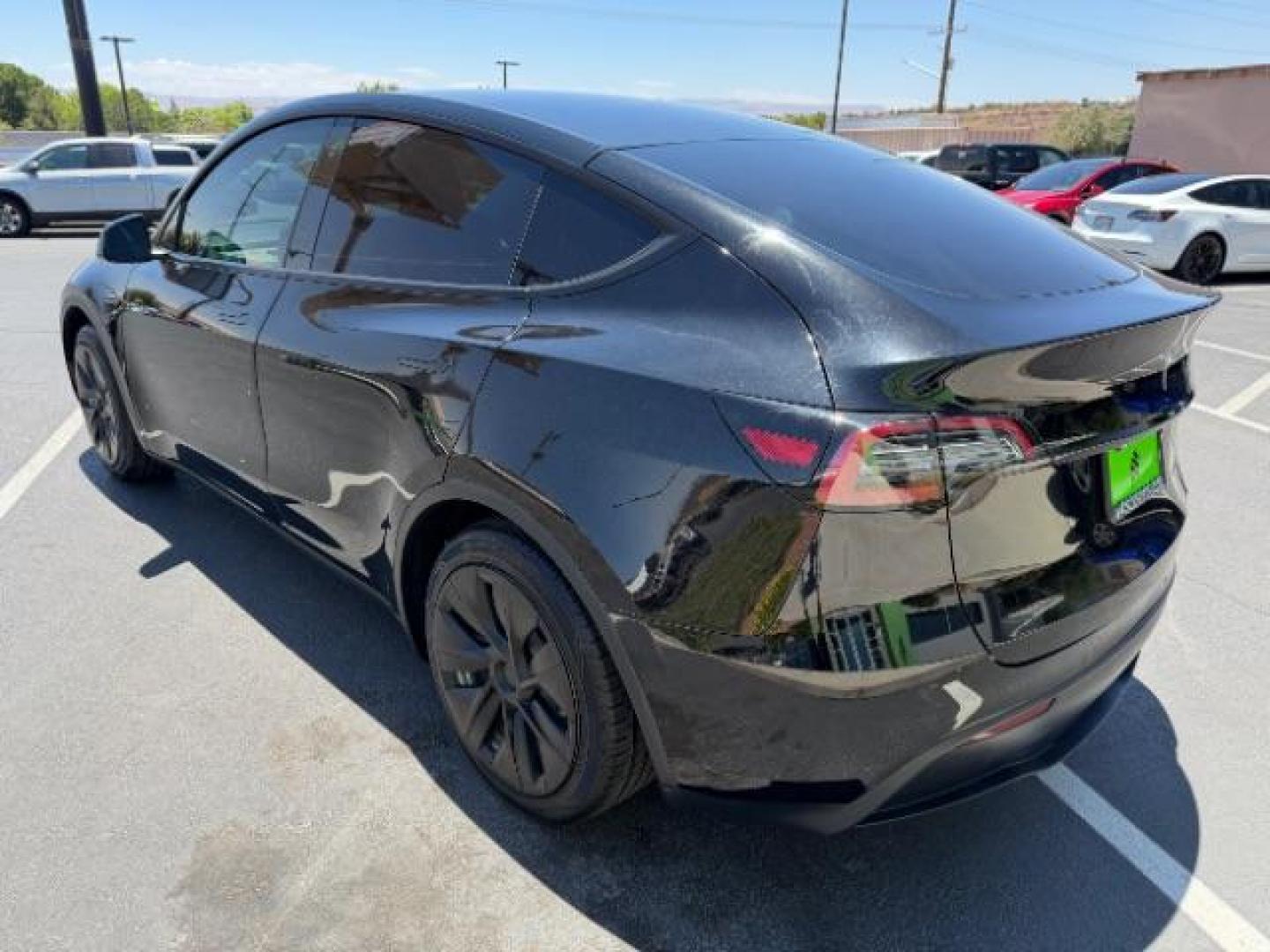 2022 Solid Black /White/Black Tesla Model Y Long Range Dual Motor All-Wheel Drive (7SAYGAEE6NF) with an ELECTRIC engine, Electric transmission, located at 1865 East Red Hills Pkwy, St. George, 84770, (435) 628-0023, 37.120850, -113.543640 - Excellent Tesla Model Y Long Range All Wheel Drive. 3rd Row, 7 Seats HW3, Interior and exterior in great condition. Small scratches and dings as pictured. Every Tesla we sell has had cabin air filter replaced, radiator cleaned, fluids topped AND comes with a mobile charging kit! Battery is healthy- Photo#6