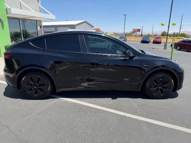 2022 Solid Black /White/Black Tesla Model Y Long Range Dual Motor All-Wheel Drive (7SAYGAEE6NF) with an ELECTRIC engine, Electric transmission, located at 1865 East Red Hills Pkwy, St. George, 84770, (435) 628-0023, 37.120850, -113.543640 - Excellent Tesla Model Y Long Range All Wheel Drive. 3rd Row, 7 Seats HW3, Interior and exterior in great condition. Small scratches and dings as pictured. Every Tesla we sell has had cabin air filter replaced, radiator cleaned, fluids topped AND comes with a mobile charging kit! Battery is healthy - Photo#9