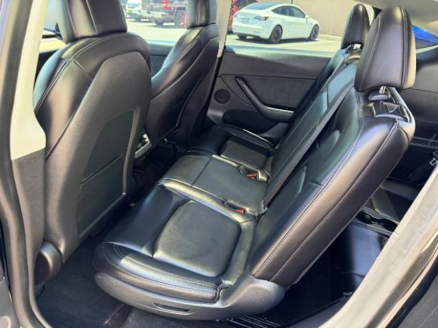 2022 Solid Black /White/Black Tesla Model Y Long Range Dual Motor All-Wheel Drive (7SAYGAEE6NF) with an ELECTRIC engine, Electric transmission, located at 1865 East Red Hills Pkwy, St. George, 84770, (435) 628-0023, 37.120850, -113.543640 - Excellent Tesla Model Y Long Range All Wheel Drive. 3rd Row, 7 Seats HW3, Interior and exterior in great condition. Small scratches and dings as pictured. Every Tesla we sell has had cabin air filter replaced, radiator cleaned, fluids topped AND comes with a mobile charging kit! Battery is healthy - Photo#16