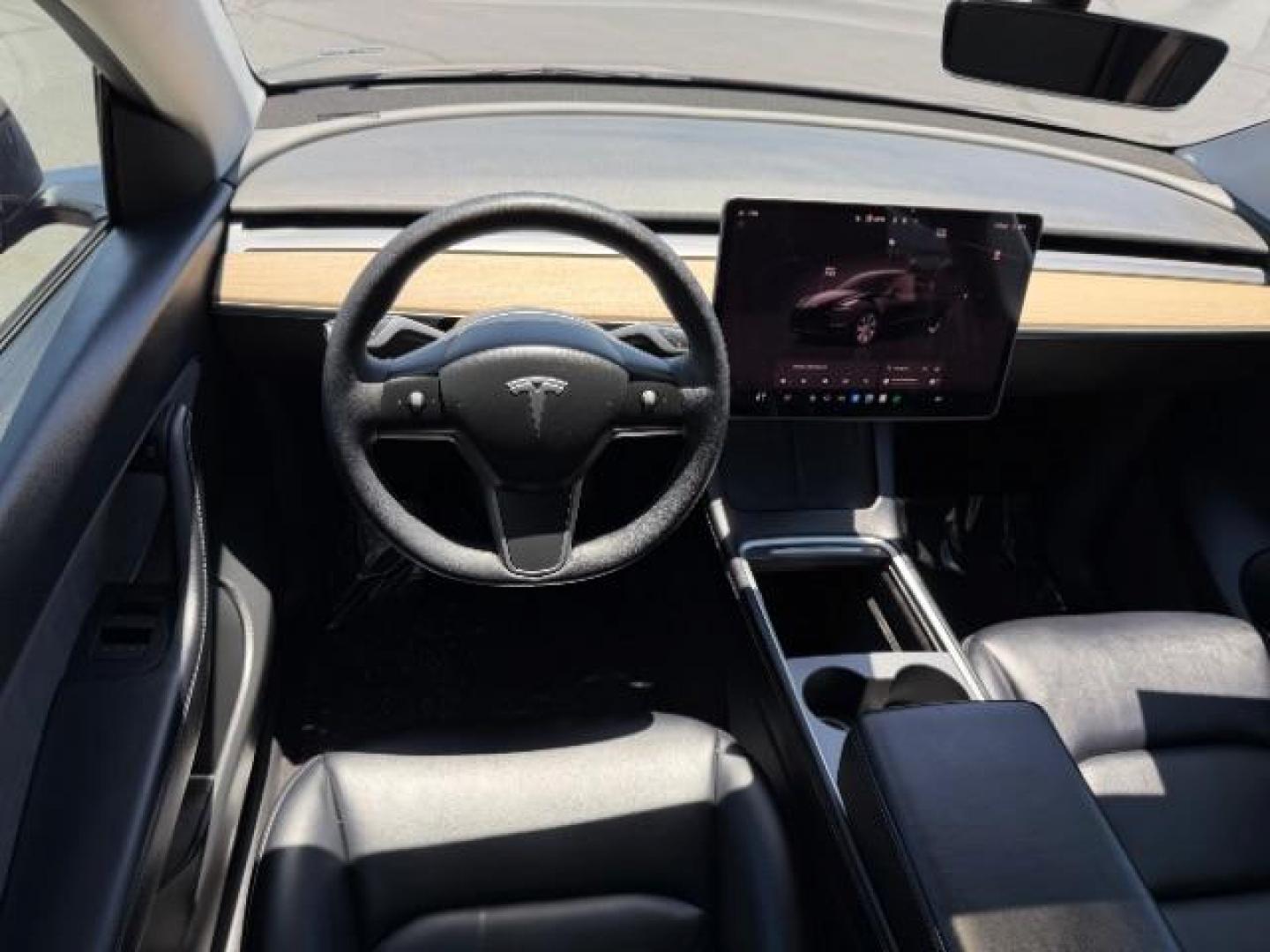 2022 Solid Black /White/Black Tesla Model Y Long Range Dual Motor All-Wheel Drive (7SAYGAEE6NF) with an ELECTRIC engine, Electric transmission, located at 1865 East Red Hills Pkwy, St. George, 84770, (435) 628-0023, 37.120850, -113.543640 - Excellent Tesla Model Y Long Range All Wheel Drive. 3rd Row, 7 Seats HW3, Interior and exterior in great condition. Small scratches and dings as pictured. Every Tesla we sell has had cabin air filter replaced, radiator cleaned, fluids topped AND comes with a mobile charging kit! Battery is healthy- Photo#17