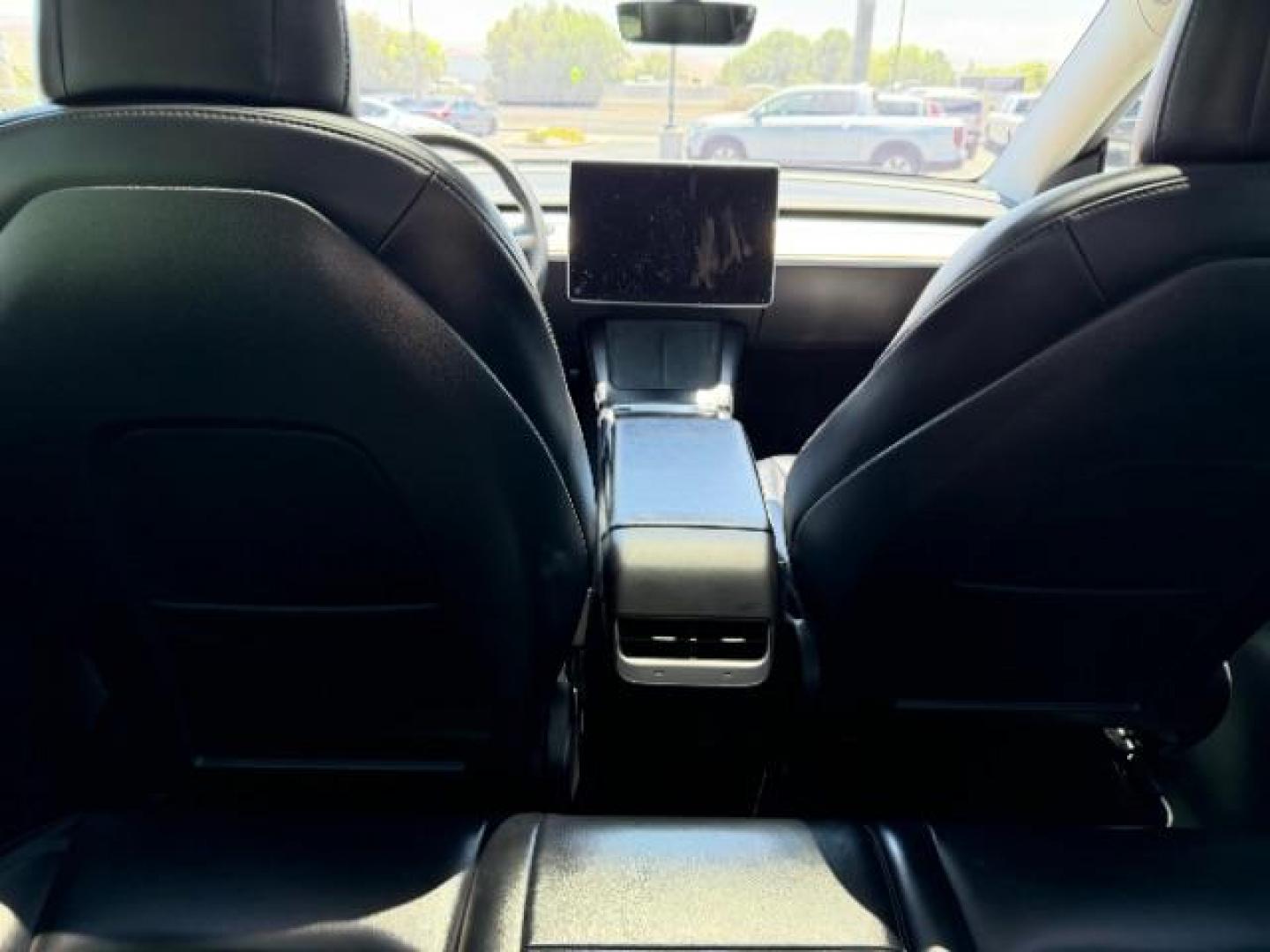 2022 Solid Black /White/Black Tesla Model Y Long Range Dual Motor All-Wheel Drive (7SAYGAEE6NF) with an ELECTRIC engine, Electric transmission, located at 1865 East Red Hills Pkwy, St. George, 84770, (435) 628-0023, 37.120850, -113.543640 - Excellent Tesla Model Y Long Range All Wheel Drive. 3rd Row, 7 Seats HW3, Interior and exterior in great condition. Small scratches and dings as pictured. Every Tesla we sell has had cabin air filter replaced, radiator cleaned, fluids topped AND comes with a mobile charging kit! Battery is healthy- Photo#18