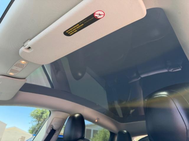 2022 Solid Black /White/Black Tesla Model Y Long Range Dual Motor All-Wheel Drive (7SAYGAEE6NF) with an ELECTRIC engine, Electric transmission, located at 1865 East Red Hills Pkwy, St. George, 84770, (435) 628-0023, 37.120850, -113.543640 - Excellent Tesla Model Y Long Range All Wheel Drive. 3rd Row, 7 Seats HW3, Interior and exterior in great condition. Small scratches and dings as pictured. Every Tesla we sell has had cabin air filter replaced, radiator cleaned, fluids topped AND comes with a mobile charging kit! Battery is healthy - Photo#24