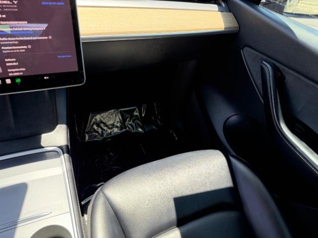 2022 Solid Black /White/Black Tesla Model Y Long Range Dual Motor All-Wheel Drive (7SAYGAEE6NF) with an ELECTRIC engine, Electric transmission, located at 1865 East Red Hills Pkwy, St. George, 84770, (435) 628-0023, 37.120850, -113.543640 - Excellent Tesla Model Y Long Range All Wheel Drive. 3rd Row, 7 Seats HW3, Interior and exterior in great condition. Small scratches and dings as pictured. Every Tesla we sell has had cabin air filter replaced, radiator cleaned, fluids topped AND comes with a mobile charging kit! Battery is healthy - Photo#26