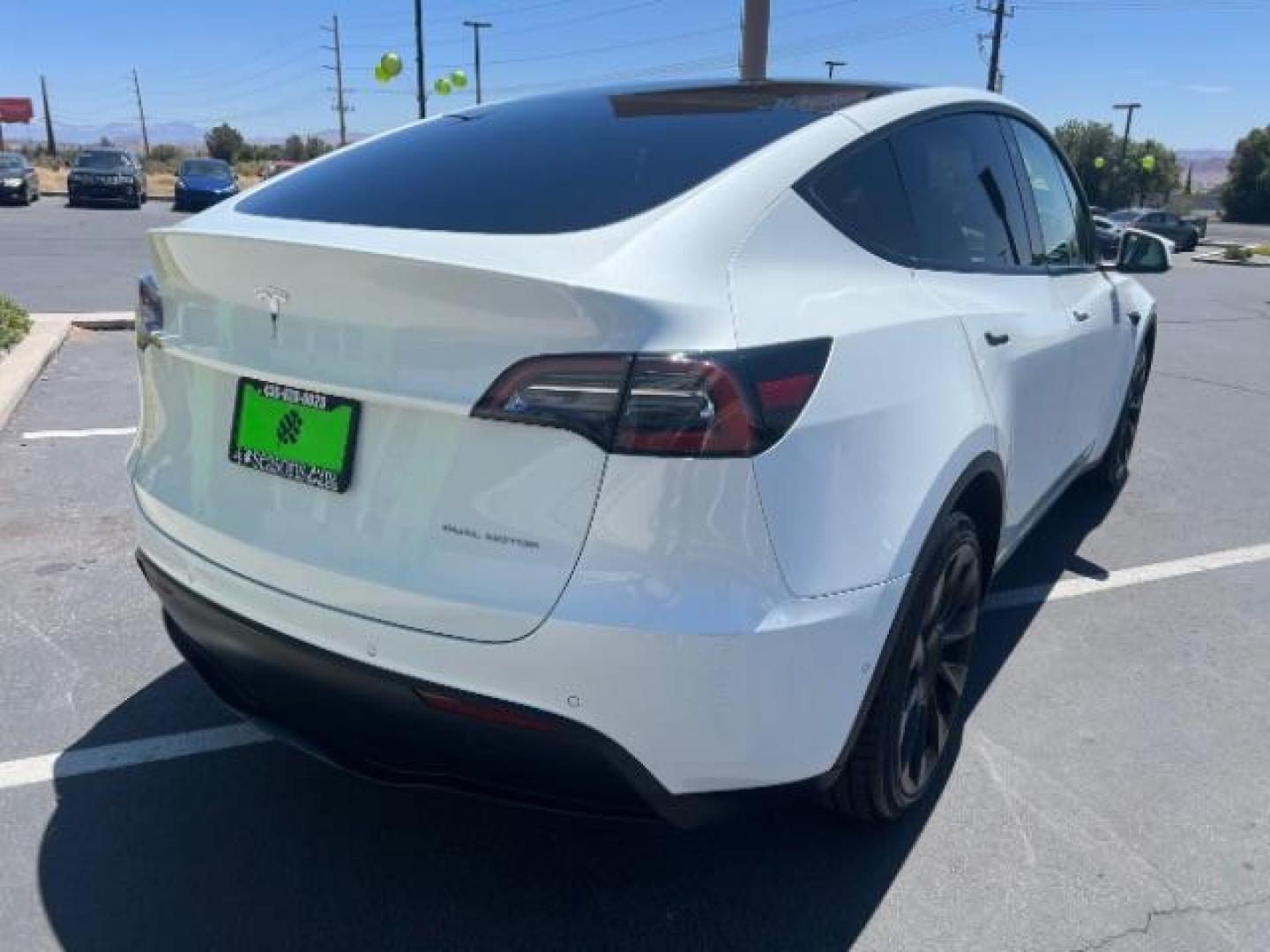 2021 Pearl White Multi-Coat /White/Black Tesla Model Y Long Range Dual Motor All-Wheel Drive (5YJYGDEE7MF) with an ELECTRIC engine, Electric transmission, located at 1865 East Red Hills Pkwy, St. George, 84770, (435) 628-0023, 37.120850, -113.543640 - Excellent Tesla Model Y Long Range All Wheel Drive. HW3, Interior and exterior in great condition. Small scratches and dings as pictured. Every Tesla we sell has had cabin air filter replaced, radiator cleaned, fluids topped AND comes with a mobile charging kit! Battery is healthy and gets 270 on- Photo#6
