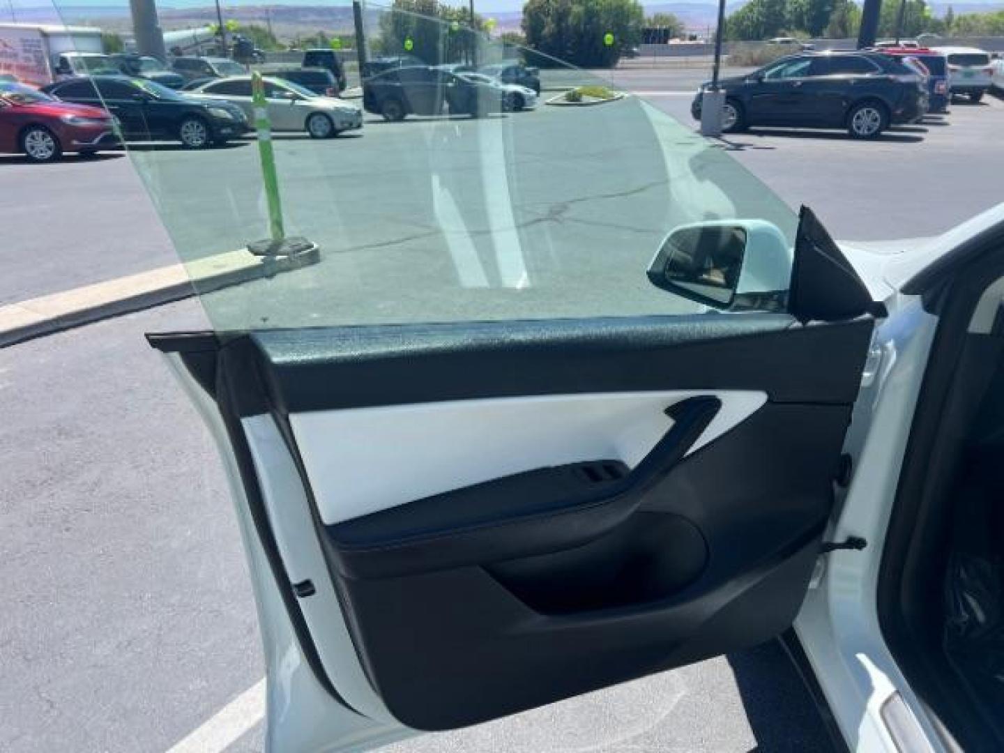 2021 Pearl White Multi-Coat /White/Black Tesla Model Y Long Range Dual Motor All-Wheel Drive (5YJYGDEE7MF) with an ELECTRIC engine, Electric transmission, located at 1865 East Red Hills Pkwy, St. George, 84770, (435) 628-0023, 37.120850, -113.543640 - Excellent Tesla Model Y Long Range All Wheel Drive. HW3, Interior and exterior in great condition. Small scratches and dings as pictured. Every Tesla we sell has had cabin air filter replaced, radiator cleaned, fluids topped AND comes with a mobile charging kit! Battery is healthy and gets 270 on- Photo#12