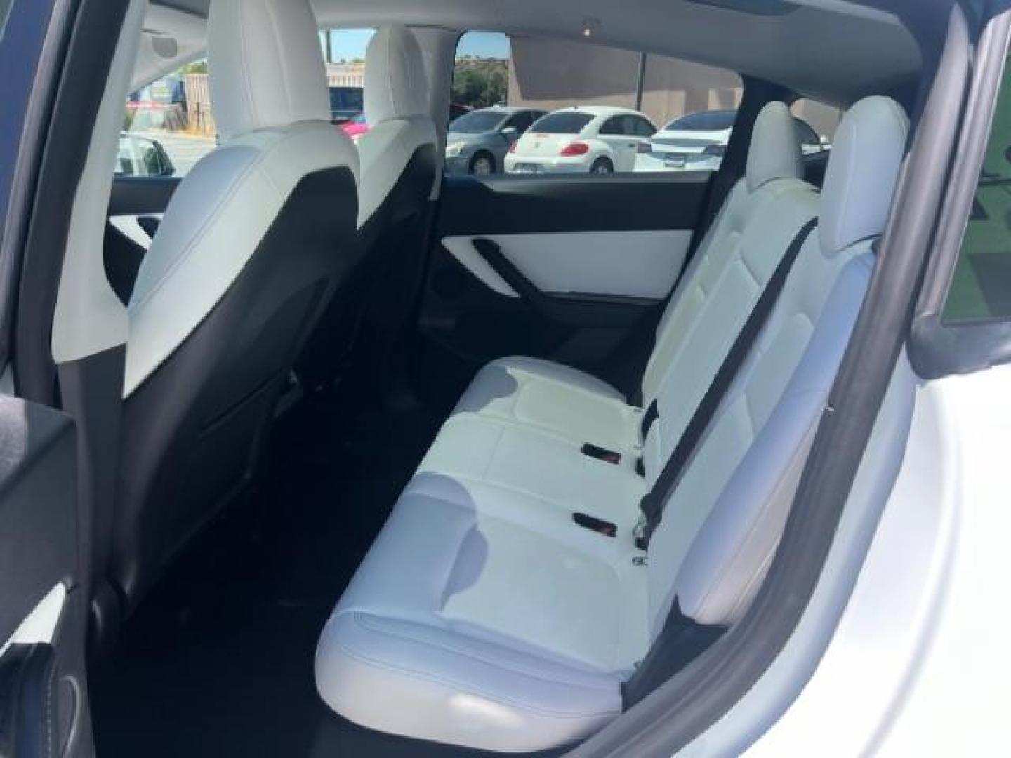 2021 Pearl White Multi-Coat /White/Black Tesla Model Y Long Range Dual Motor All-Wheel Drive (5YJYGDEE7MF) with an ELECTRIC engine, Electric transmission, located at 1865 East Red Hills Pkwy, St. George, 84770, (435) 628-0023, 37.120850, -113.543640 - Excellent Tesla Model Y Long Range All Wheel Drive. HW3, Interior and exterior in great condition. Small scratches and dings as pictured. Every Tesla we sell has had cabin air filter replaced, radiator cleaned, fluids topped AND comes with a mobile charging kit! Battery is healthy and gets 270 on- Photo#19