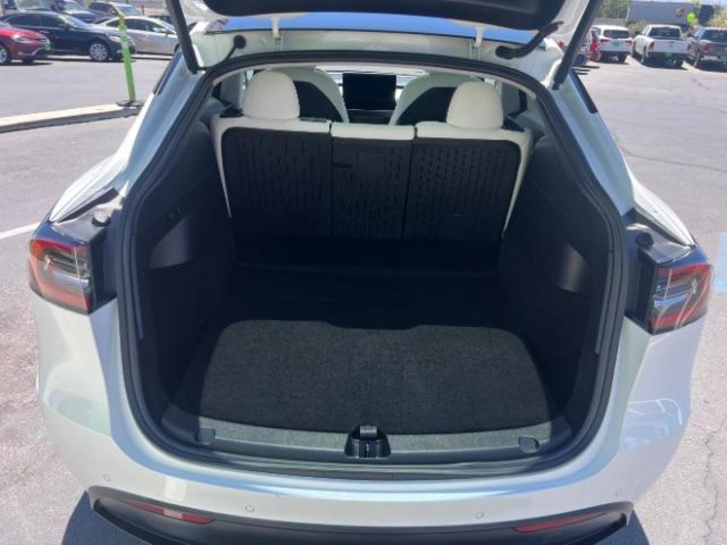 2021 Pearl White Multi-Coat /White/Black Tesla Model Y Long Range Dual Motor All-Wheel Drive (5YJYGDEE7MF) with an ELECTRIC engine, Electric transmission, located at 1865 East Red Hills Pkwy, St. George, 84770, (435) 628-0023, 37.120850, -113.543640 - Excellent Tesla Model Y Long Range All Wheel Drive. HW3, Interior and exterior in great condition. Small scratches and dings as pictured. Every Tesla we sell has had cabin air filter replaced, radiator cleaned, fluids topped AND comes with a mobile charging kit! Battery is healthy and gets 270 on- Photo#22