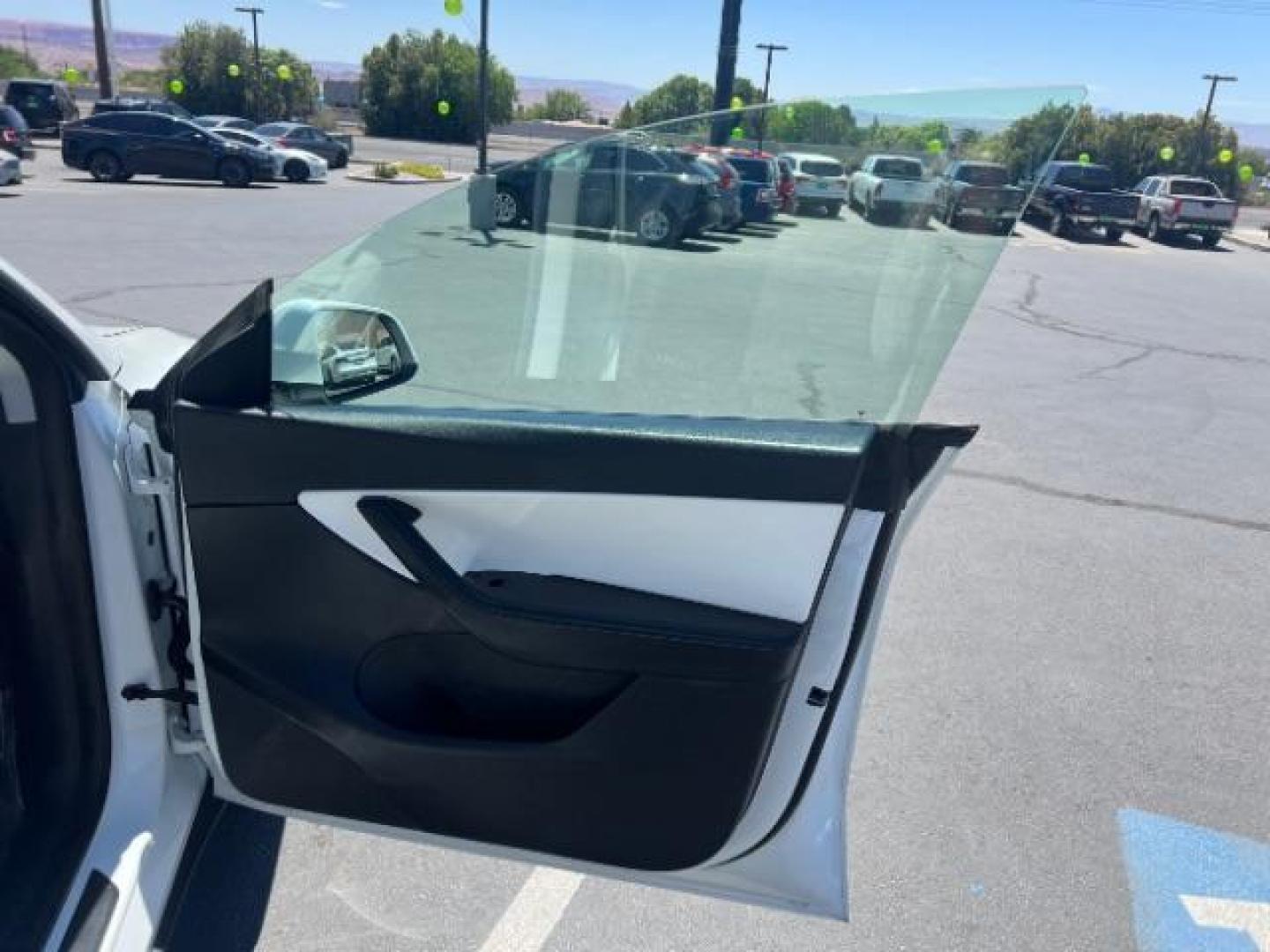 2021 Pearl White Multi-Coat /White/Black Tesla Model Y Long Range Dual Motor All-Wheel Drive (5YJYGDEE7MF) with an ELECTRIC engine, Electric transmission, located at 1865 East Red Hills Pkwy, St. George, 84770, (435) 628-0023, 37.120850, -113.543640 - Excellent Tesla Model Y Long Range All Wheel Drive. HW3, Interior and exterior in great condition. Small scratches and dings as pictured. Every Tesla we sell has had cabin air filter replaced, radiator cleaned, fluids topped AND comes with a mobile charging kit! Battery is healthy and gets 270 on- Photo#25