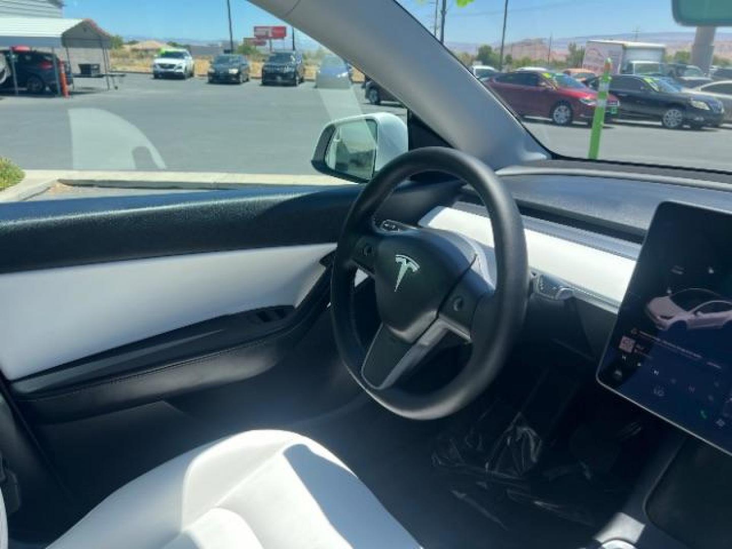 2021 Pearl White Multi-Coat /White/Black Tesla Model Y Long Range Dual Motor All-Wheel Drive (5YJYGDEE7MF) with an ELECTRIC engine, Electric transmission, located at 1865 East Red Hills Pkwy, St. George, 84770, (435) 628-0023, 37.120850, -113.543640 - Excellent Tesla Model Y Long Range All Wheel Drive. HW3, Interior and exterior in great condition. Small scratches and dings as pictured. Every Tesla we sell has had cabin air filter replaced, radiator cleaned, fluids topped AND comes with a mobile charging kit! Battery is healthy and gets 270 on- Photo#27