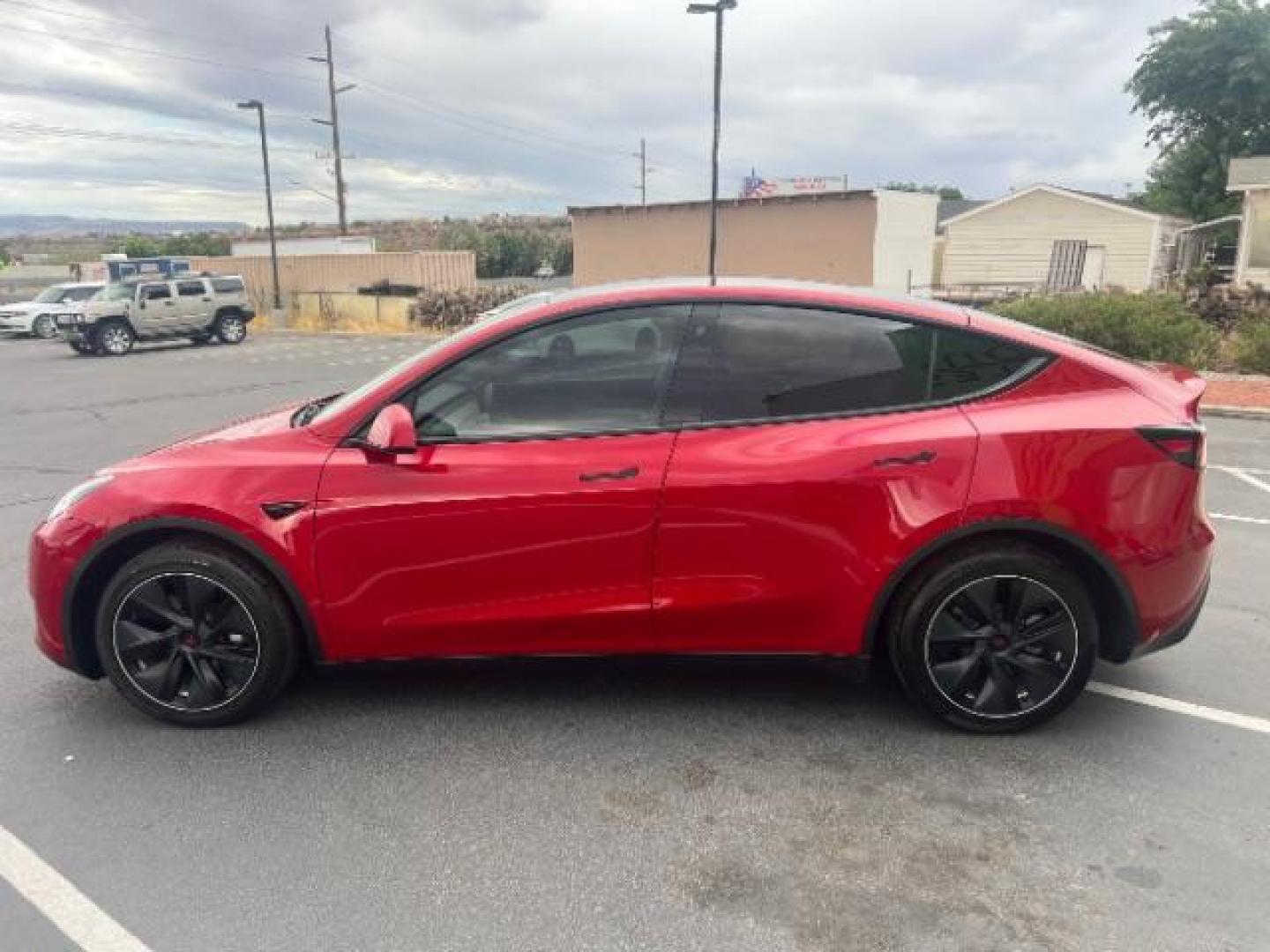 2022 Red Multi-Coat /Black Tesla Model Y Long Range Dual Motor All-Wheel Drive (7SAYGDEE8NF) with an ELECTRIC engine, Electric transmission, located at 1865 East Red Hills Pkwy, St. George, 84770, (435) 628-0023, 37.120850, -113.543640 - Excellent Tesla Model Y Long Range All Wheel Drive. HW3, Interior and exterior in great condition. Small scratches and dings as pictured. Every Tesla we sell has had cabin air filter replaced, radiator cleaned, fluids topped AND comes with a mobile charging kit! Battery is healthy and gets 270 on- Photo#5