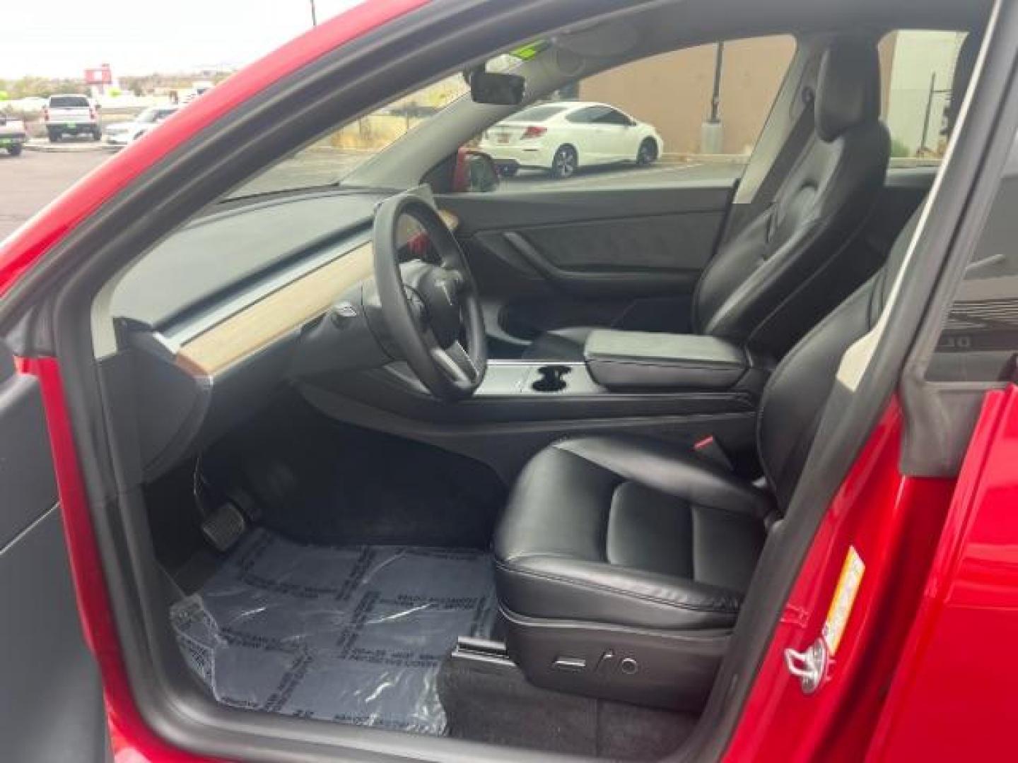2022 Red Multi-Coat /Black Tesla Model Y Long Range Dual Motor All-Wheel Drive (7SAYGDEE8NF) with an ELECTRIC engine, Electric transmission, located at 1865 East Red Hills Pkwy, St. George, 84770, (435) 628-0023, 37.120850, -113.543640 - Excellent Tesla Model Y Long Range All Wheel Drive. HW3, Interior and exterior in great condition. Small scratches and dings as pictured. Every Tesla we sell has had cabin air filter replaced, radiator cleaned, fluids topped AND comes with a mobile charging kit! Battery is healthy and gets 270 on- Photo#16