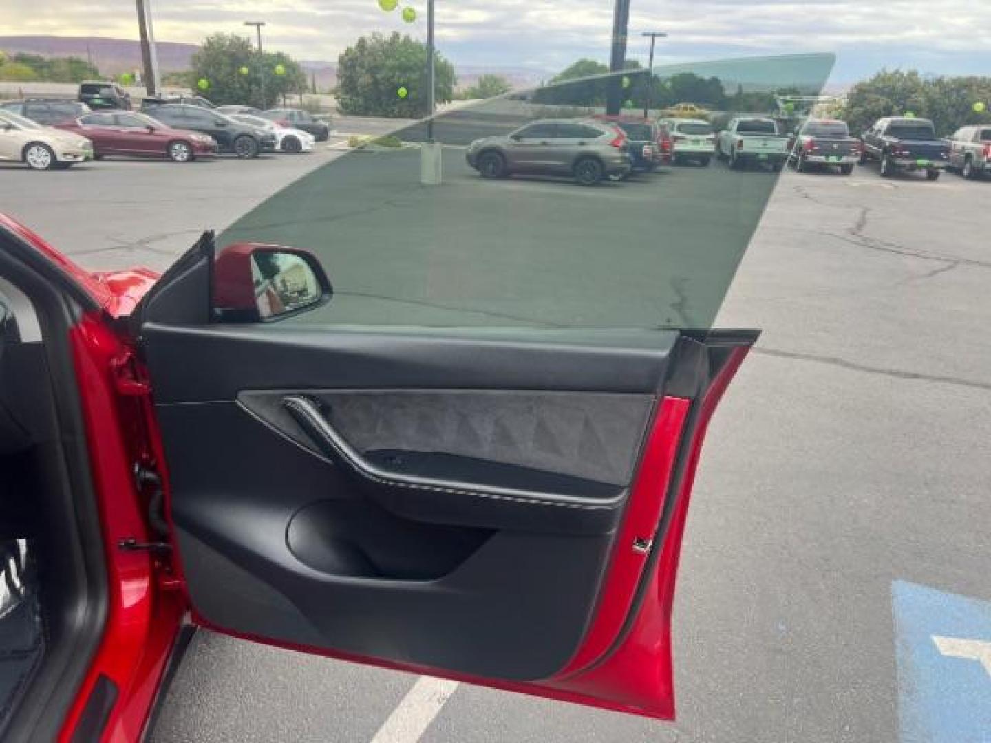 2022 Red Multi-Coat /Black Tesla Model Y Long Range Dual Motor All-Wheel Drive (7SAYGDEE8NF) with an ELECTRIC engine, Electric transmission, located at 1865 East Red Hills Pkwy, St. George, 84770, (435) 628-0023, 37.120850, -113.543640 - Excellent Tesla Model Y Long Range All Wheel Drive. HW3, Interior and exterior in great condition. Small scratches and dings as pictured. Every Tesla we sell has had cabin air filter replaced, radiator cleaned, fluids topped AND comes with a mobile charging kit! Battery is healthy and gets 270 on- Photo#27