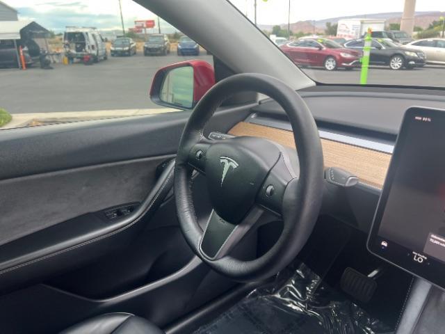 2022 Red Multi-Coat /Black Tesla Model Y Long Range Dual Motor All-Wheel Drive (7SAYGDEE8NF) with an ELECTRIC engine, Electric transmission, located at 1865 East Red Hills Pkwy, St. George, 84770, (435) 628-0023, 37.120850, -113.543640 - Excellent Tesla Model Y Long Range All Wheel Drive. HW3, Interior and exterior in great condition. Small scratches and dings as pictured. Every Tesla we sell has had cabin air filter replaced, radiator cleaned, fluids topped AND comes with a mobile charging kit! Battery is healthy and gets 270 on - Photo#29