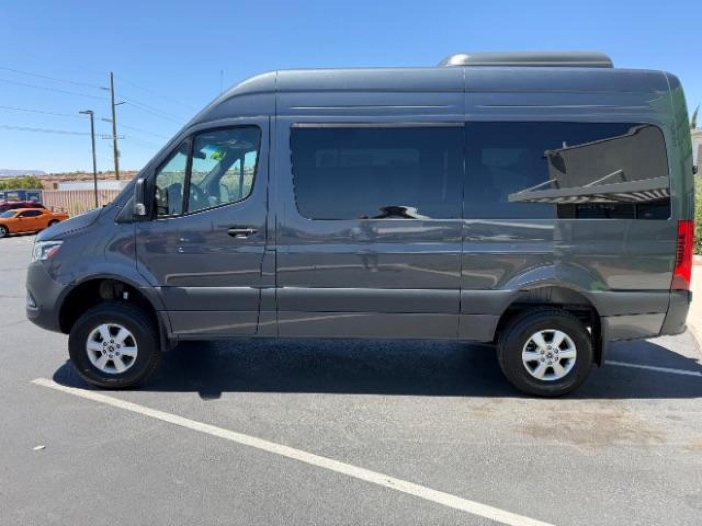 2024 Graphite Grey /Black Mercedes-Benz Sprinter 2500 High Roof 107 inches (W1Z4NFVY5RP) with an 2L I-4 diesel direct injection engine, AUTOMATIC transmission, located at 1865 East Red Hills Pkwy, St. George, 84770, (435) 628-0023, 37.120850, -113.543640 - ALL WHEEL DRIVE, 12 Passenger, Leather, Upgraded A/C roof unit, 360 Camera, Rear step, Large info screen, High output engine. 1 Owner, NO accidents Optional Equipment XM4 - Acoustic Package $97 JA7 - Blind Spot Assist $504 L13 - Fog Lamp with Cornering Light Function $223 H15 - Heated Front Passe- Photo#3