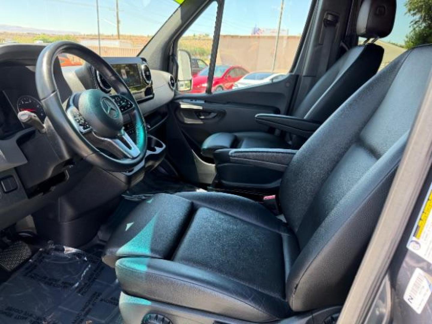 2024 Graphite Grey /Black Mercedes-Benz Sprinter 2500 High Roof 107 inches (W1Z4NFVY5RP) with an 2L I-4 diesel direct injection engine, AUTOMATIC transmission, located at 1865 East Red Hills Pkwy, St. George, 84770, (435) 628-0023, 37.120850, -113.543640 - ALL WHEEL DRIVE, 12 Passenger, Leather, Upgraded A/C roof unit, 360 Camera, Rear step, Large info screen, High output engine. 1 Owner, NO accidents Optional Equipment XM4 - Acoustic Package $97 JA7 - Blind Spot Assist $504 L13 - Fog Lamp with Cornering Light Function $223 H15 - Heated Front Passe- Photo#23