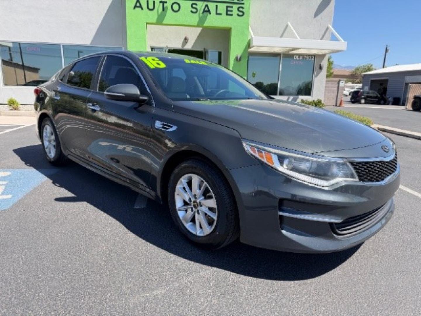 2016 Titanium Gray /Beige Kia Optima LX (5XXGT4L3XGG) with an Theta II 2.4L I-4 gasoline direct injection engine, Automatic transmission, located at 940 North Main Street, Cedar City, UT, 84720, (435) 628-0023, 37.692936, -113.061897 - We specialize in helping ALL people get the best financing available. No matter your credit score, good, bad or none we can get you an amazing rate. Had a bankruptcy, divorce, or repossessions? We give you the green light to get your credit back on the road. Low down and affordable payments that fit- Photo#0