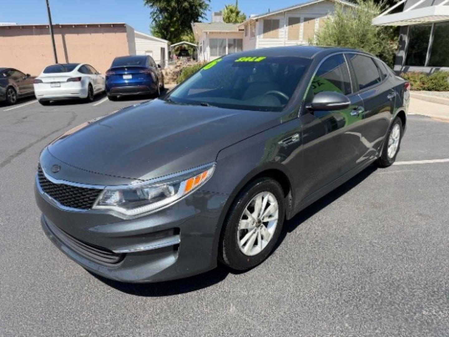 2016 Titanium Gray /Beige Kia Optima LX (5XXGT4L3XGG) with an Theta II 2.4L I-4 gasoline direct injection engine, Automatic transmission, located at 940 North Main Street, Cedar City, UT, 84720, (435) 628-0023, 37.692936, -113.061897 - We specialize in helping ALL people get the best financing available. No matter your credit score, good, bad or none we can get you an amazing rate. Had a bankruptcy, divorce, or repossessions? We give you the green light to get your credit back on the road. Low down and affordable payments that fit- Photo#2