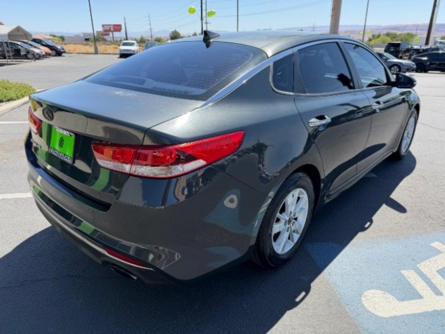 2016 Titanium Gray /Beige Kia Optima LX (5XXGT4L3XGG) with an Theta II 2.4L I-4 gasoline direct injection engine, Automatic transmission, located at 940 North Main Street, Cedar City, UT, 84720, (435) 628-0023, 37.692936, -113.061897 - We specialize in helping ALL people get the best financing available. No matter your credit score, good, bad or none we can get you an amazing rate. Had a bankruptcy, divorce, or repossessions? We give you the green light to get your credit back on the road. Low down and affordable payments that fit- Photo#4