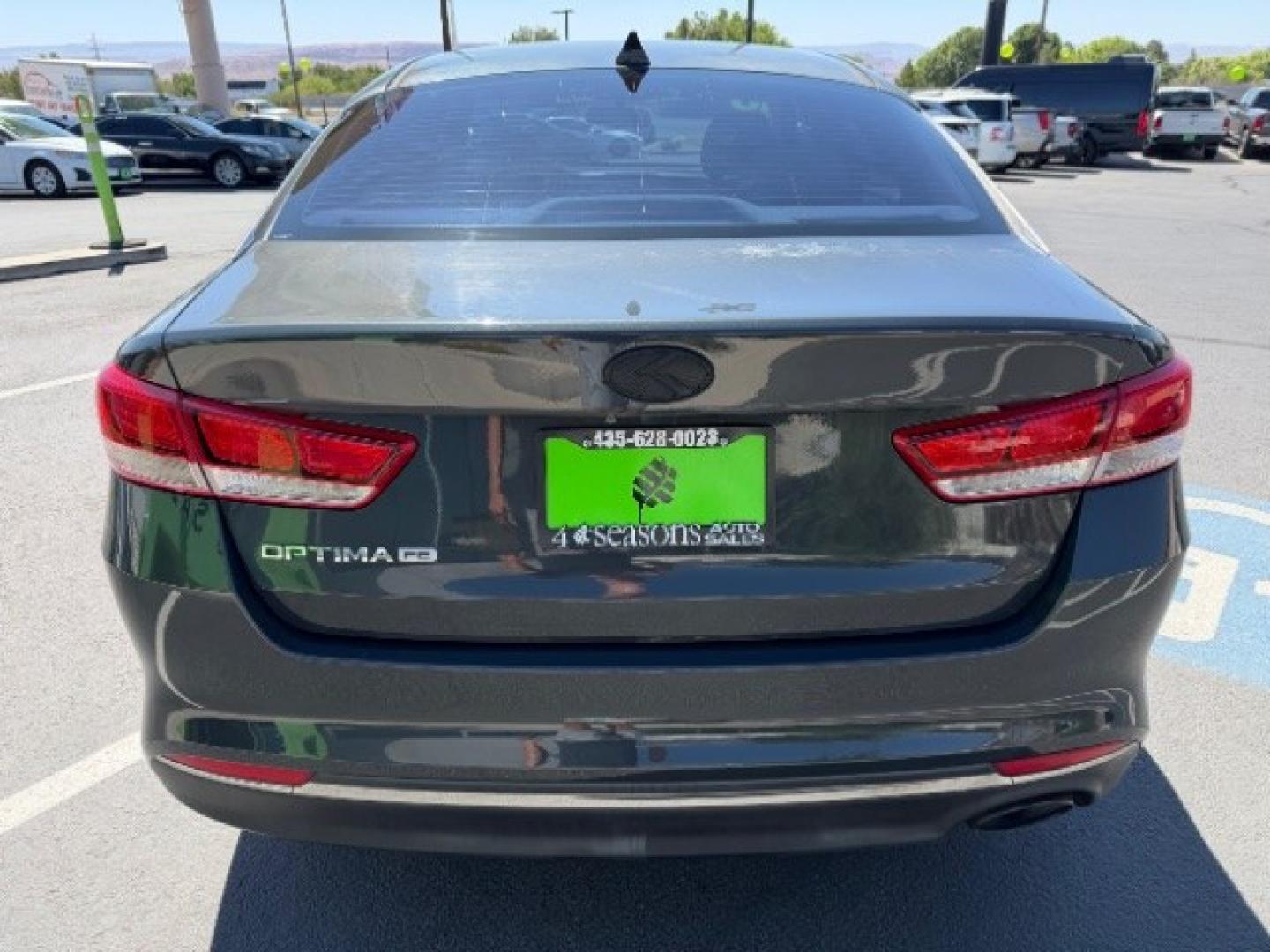 2016 Titanium Gray /Beige Kia Optima LX (5XXGT4L3XGG) with an Theta II 2.4L I-4 gasoline direct injection engine, Automatic transmission, located at 940 North Main Street, Cedar City, UT, 84720, (435) 628-0023, 37.692936, -113.061897 - We specialize in helping ALL people get the best financing available. No matter your credit score, good, bad or none we can get you an amazing rate. Had a bankruptcy, divorce, or repossessions? We give you the green light to get your credit back on the road. Low down and affordable payments that fit- Photo#5