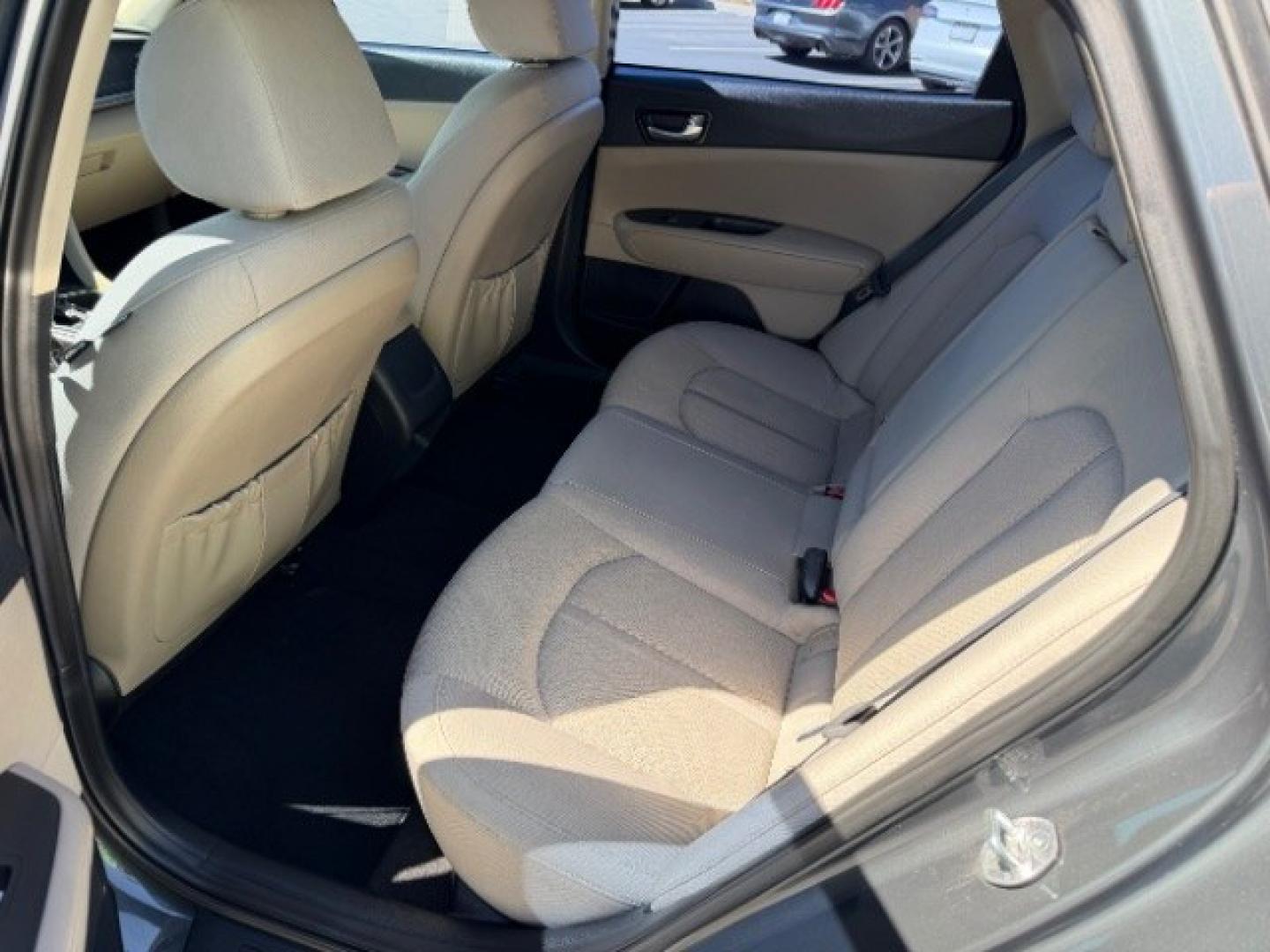 2016 Titanium Gray /Beige Kia Optima LX (5XXGT4L3XGG) with an Theta II 2.4L I-4 gasoline direct injection engine, Automatic transmission, located at 940 North Main Street, Cedar City, UT, 84720, (435) 628-0023, 37.692936, -113.061897 - We specialize in helping ALL people get the best financing available. No matter your credit score, good, bad or none we can get you an amazing rate. Had a bankruptcy, divorce, or repossessions? We give you the green light to get your credit back on the road. Low down and affordable payments that fit- Photo#18
