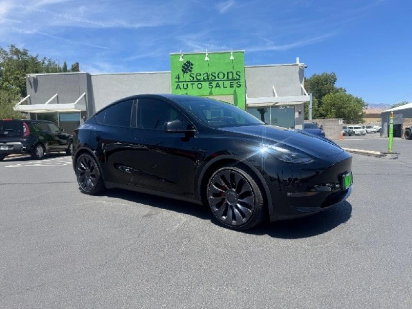 2022 Solid Black /Black Tesla Model Y Performance Dual Motor All-Wheel Drive (7SAYGDEFXNF) , located at 1865 East Red Hills Pkwy, St. George, 84770, (435) 628-0023, 37.120850, -113.543640 - Excellent Tesla Model Y Long Range All Wheel Drive Performance with FSD PAID FOR ($8k Full Self Driving Subscription fully transfers to new owner. Lock in FSD for life! 5 Seats HW3, Interior and exterior in great condition. Small scratches and dings as pictured. Every Tesla we sell has had cabin ai- Photo#0
