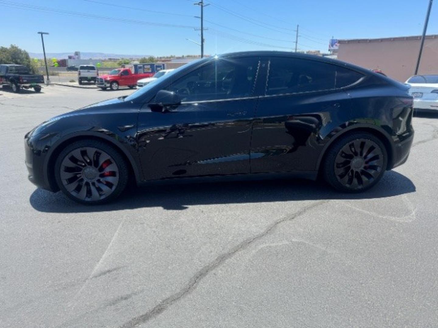 2022 Solid Black /Black Tesla Model Y Performance Dual Motor All-Wheel Drive (7SAYGDEFXNF) , located at 1865 East Red Hills Pkwy, St. George, 84770, (435) 628-0023, 37.120850, -113.543640 - Excellent Tesla Model Y Long Range All Wheel Drive Performance with FSD PAID FOR ($8k Full Self Driving Subscription fully transfers to new owner. Lock in FSD for life! 5 Seats HW3, Interior and exterior in great condition. Small scratches and dings as pictured. Every Tesla we sell has had cabin ai- Photo#4