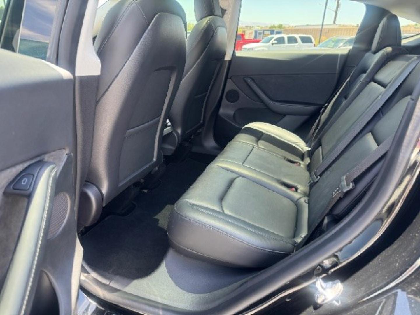2022 Solid Black /Black Tesla Model Y Performance Dual Motor All-Wheel Drive (7SAYGDEFXNF) , located at 1865 East Red Hills Pkwy, St. George, 84770, (435) 628-0023, 37.120850, -113.543640 - Excellent Tesla Model Y Long Range All Wheel Drive Performance with FSD PAID FOR ($8k Full Self Driving Subscription fully transfers to new owner. Lock in FSD for life! 5 Seats HW3, Interior and exterior in great condition. Small scratches and dings as pictured. Every Tesla we sell has had cabin ai- Photo#16