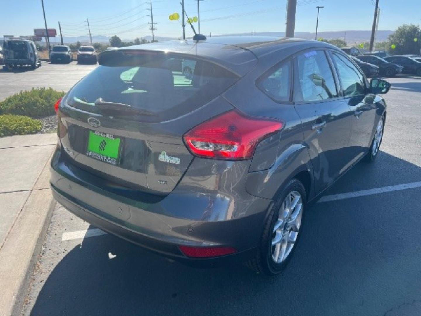 2015 Magnetic /Charcoal Black Ford Focus SE (1FADP3K25FL) with an 2L I-4 gasoline direct injection engine, Automatic transmission, located at 940 North Main Street, Cedar City, UT, 84720, (435) 628-0023, 37.692936, -113.061897 - We specialize in helping ALL people get the best financing available. No matter your credit score, good, bad or none we can get you an amazing rate. Had a bankruptcy, divorce, or repossessions? We give you the green light to get your credit back on the road. Low down and affordable payments that fit- Photo#6