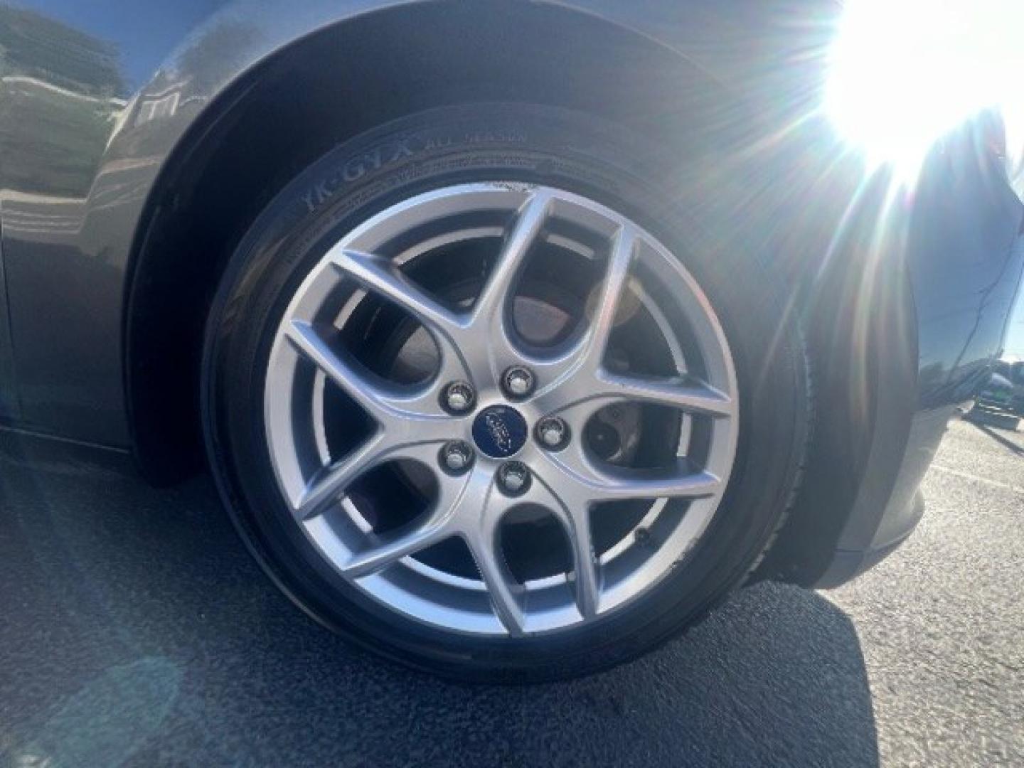 2015 Magnetic /Charcoal Black Ford Focus SE (1FADP3K25FL) with an 2L I-4 gasoline direct injection engine, Automatic transmission, located at 940 North Main Street, Cedar City, UT, 84720, (435) 628-0023, 37.692936, -113.061897 - We specialize in helping ALL people get the best financing available. No matter your credit score, good, bad or none we can get you an amazing rate. Had a bankruptcy, divorce, or repossessions? We give you the green light to get your credit back on the road. Low down and affordable payments that fit- Photo#8