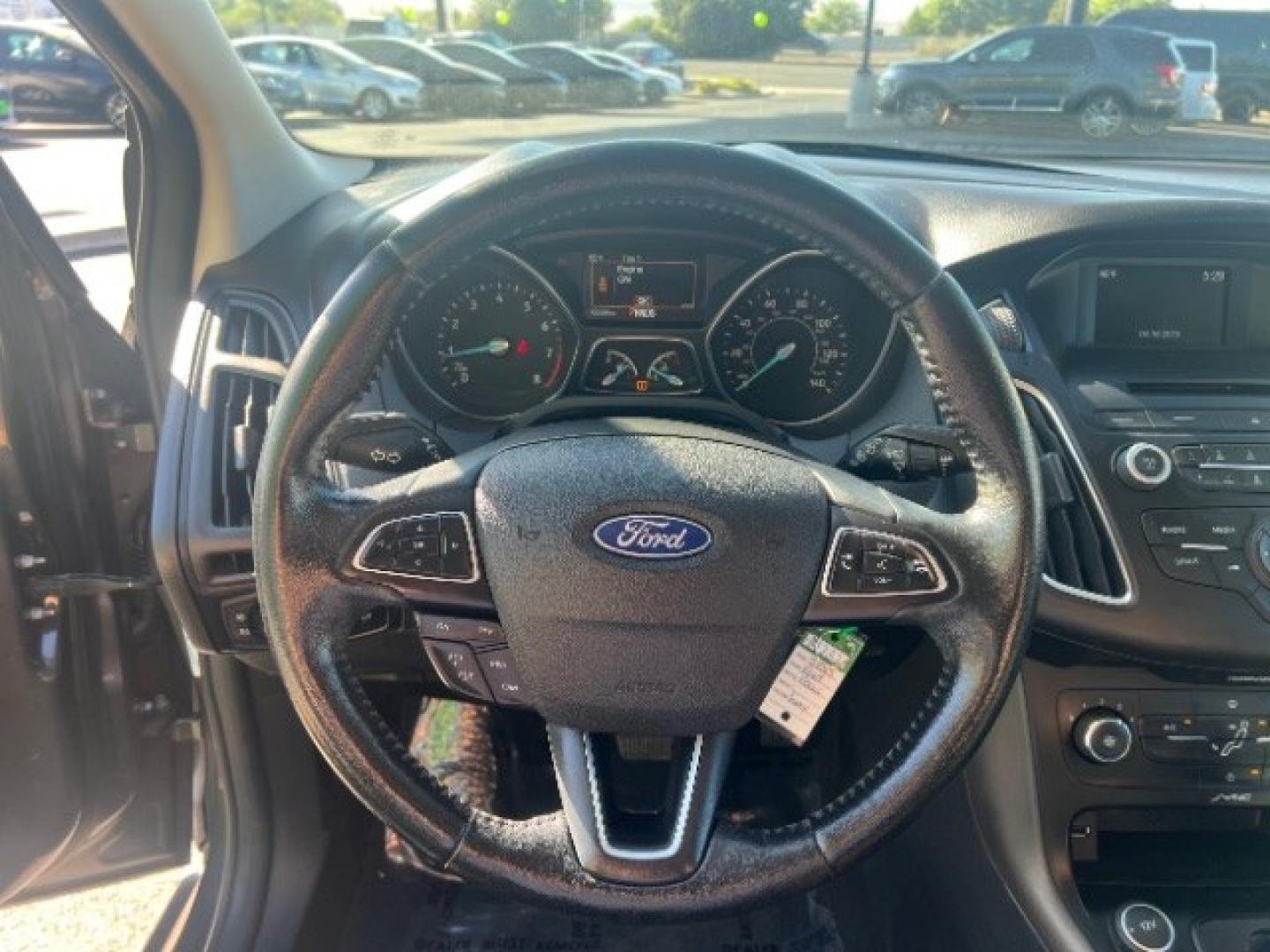 2015 Magnetic /Charcoal Black Ford Focus SE (1FADP3K25FL) with an 2L I-4 gasoline direct injection engine, Automatic transmission, located at 940 North Main Street, Cedar City, UT, 84720, (435) 628-0023, 37.692936, -113.061897 - We specialize in helping ALL people get the best financing available. No matter your credit score, good, bad or none we can get you an amazing rate. Had a bankruptcy, divorce, or repossessions? We give you the green light to get your credit back on the road. Low down and affordable payments that fit- Photo#15