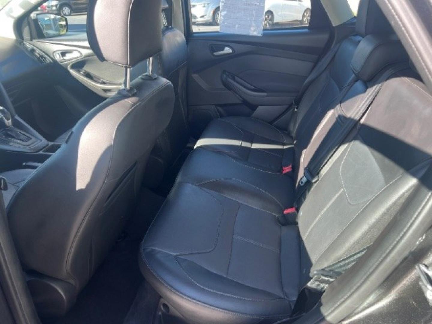 2015 Magnetic /Charcoal Black Ford Focus SE (1FADP3K25FL) with an 2L I-4 gasoline direct injection engine, Automatic transmission, located at 940 North Main Street, Cedar City, UT, 84720, (435) 628-0023, 37.692936, -113.061897 - We specialize in helping ALL people get the best financing available. No matter your credit score, good, bad or none we can get you an amazing rate. Had a bankruptcy, divorce, or repossessions? We give you the green light to get your credit back on the road. Low down and affordable payments that fit- Photo#20