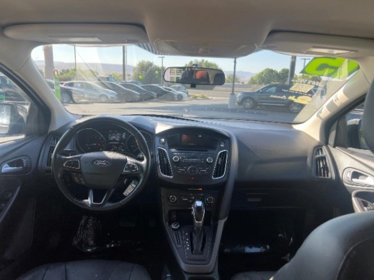 2015 Magnetic /Charcoal Black Ford Focus SE (1FADP3K25FL) with an 2L I-4 gasoline direct injection engine, Automatic transmission, located at 940 North Main Street, Cedar City, UT, 84720, (435) 628-0023, 37.692936, -113.061897 - We specialize in helping ALL people get the best financing available. No matter your credit score, good, bad or none we can get you an amazing rate. Had a bankruptcy, divorce, or repossessions? We give you the green light to get your credit back on the road. Low down and affordable payments that fit- Photo#22