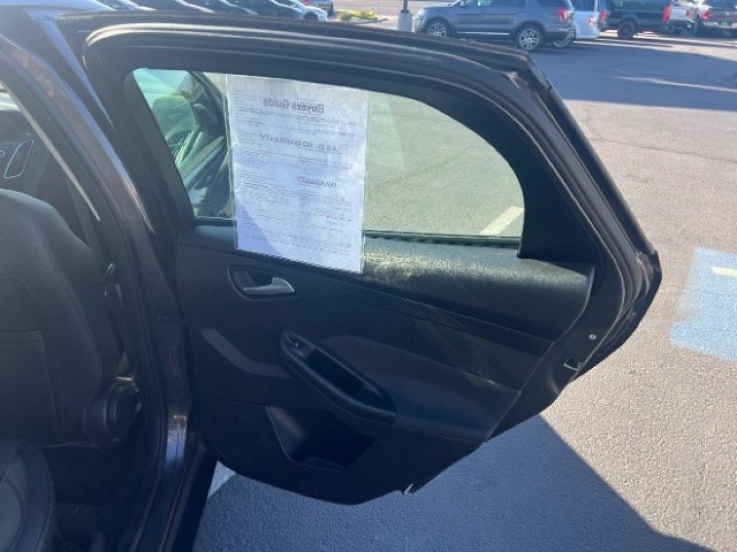2015 Magnetic /Charcoal Black Ford Focus SE (1FADP3K25FL) with an 2L I-4 gasoline direct injection engine, Automatic transmission, located at 940 North Main Street, Cedar City, UT, 84720, (435) 628-0023, 37.692936, -113.061897 - We specialize in helping ALL people get the best financing available. No matter your credit score, good, bad or none we can get you an amazing rate. Had a bankruptcy, divorce, or repossessions? We give you the green light to get your credit back on the road. Low down and affordable payments that fit- Photo#24