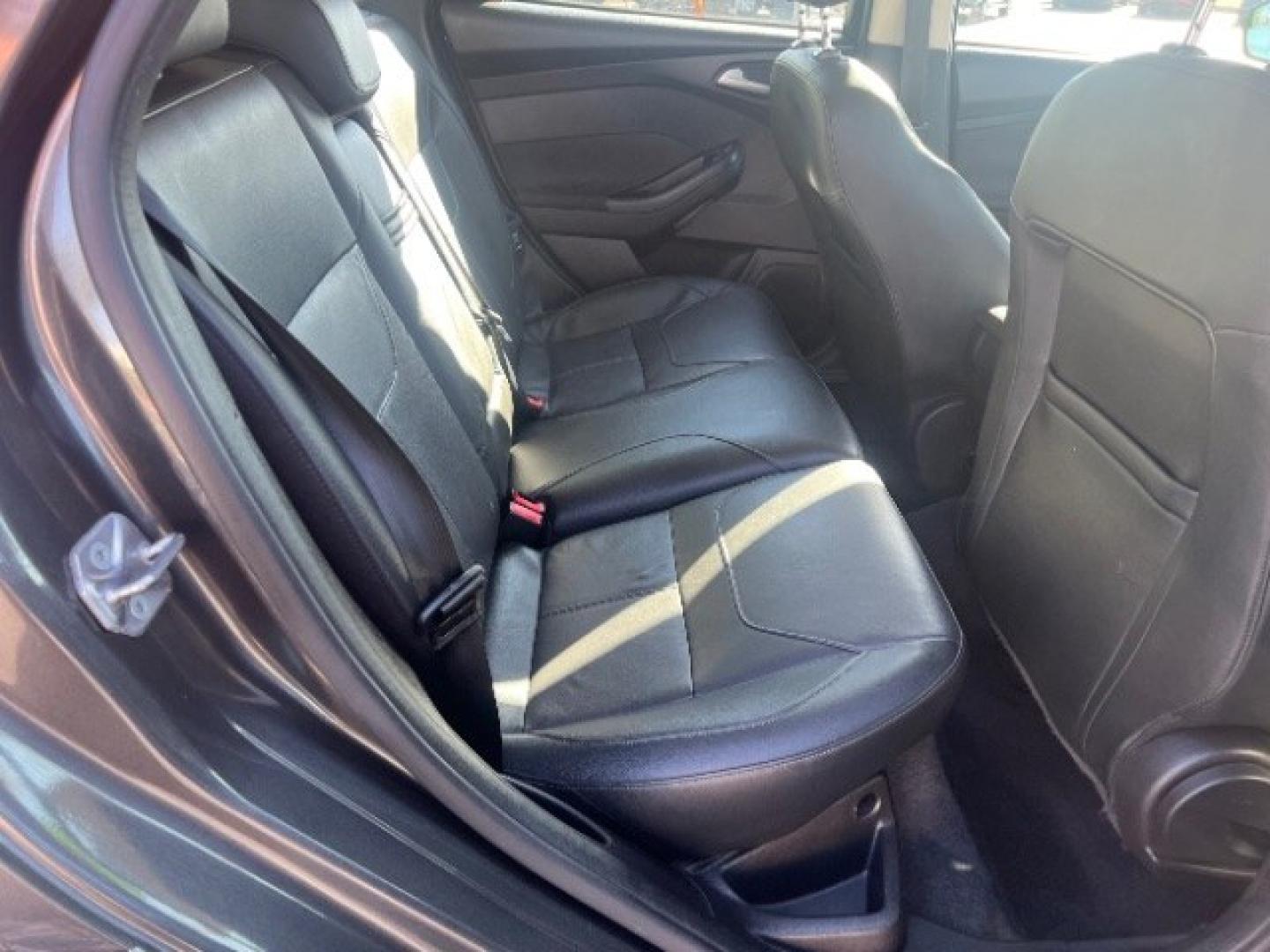 2015 Magnetic /Charcoal Black Ford Focus SE (1FADP3K25FL) with an 2L I-4 gasoline direct injection engine, Automatic transmission, located at 940 North Main Street, Cedar City, UT, 84720, (435) 628-0023, 37.692936, -113.061897 - We specialize in helping ALL people get the best financing available. No matter your credit score, good, bad or none we can get you an amazing rate. Had a bankruptcy, divorce, or repossessions? We give you the green light to get your credit back on the road. Low down and affordable payments that fit- Photo#25
