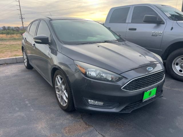 2015 Magnetic /Charcoal Black Ford Focus SE (1FADP3K25FL) with an 2L I-4 gasoline direct injection engine, Automatic transmission, located at 1865 East Red Hills Pkwy, St. George, 84770, (435) 628-0023, 37.120850, -113.543640 - Versatile Southern Utah travel starts with this 2015 Ford Focus SE. Its 2.0L 4-cylinder engine, 6-speed automatic transmission, and front-wheel drive make it a smart fit for commuting, errands, and budget-friendly road trips around Southern Utah. This Focus is ready for its next adventure. The SE a- Photo#0