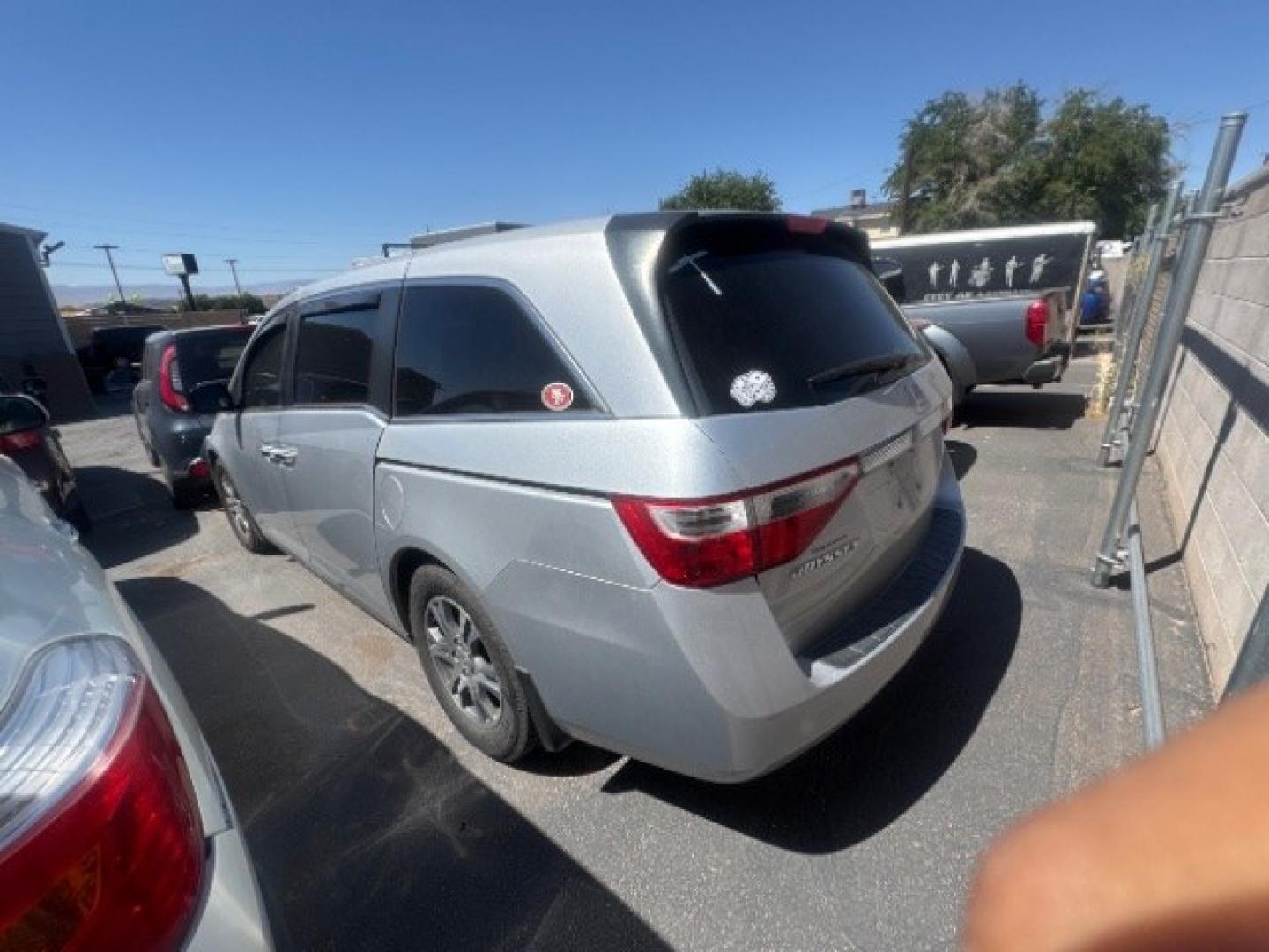 2012 Alabaster Silver Metallic /Gray Honda Odyssey EX-L (5FNRL5H6XCB) with an 3.5L V-6 i-VTEC variable valve control engine, Automatic transmission, located at 1865 East Red Hills Pkwy, St. George, 84770, (435) 628-0023, 37.120850, -113.543640 - This vehicle is a Mechanic Special. This means it will need some love. Runs a drives fine but has body damage, leaks or other mechanical issues. It did NOT pass our 50 point inspection. Get a great deal on a less than perfect car. These cars do NOT qualify for our in house financing. Cash and carry,- Photo#4