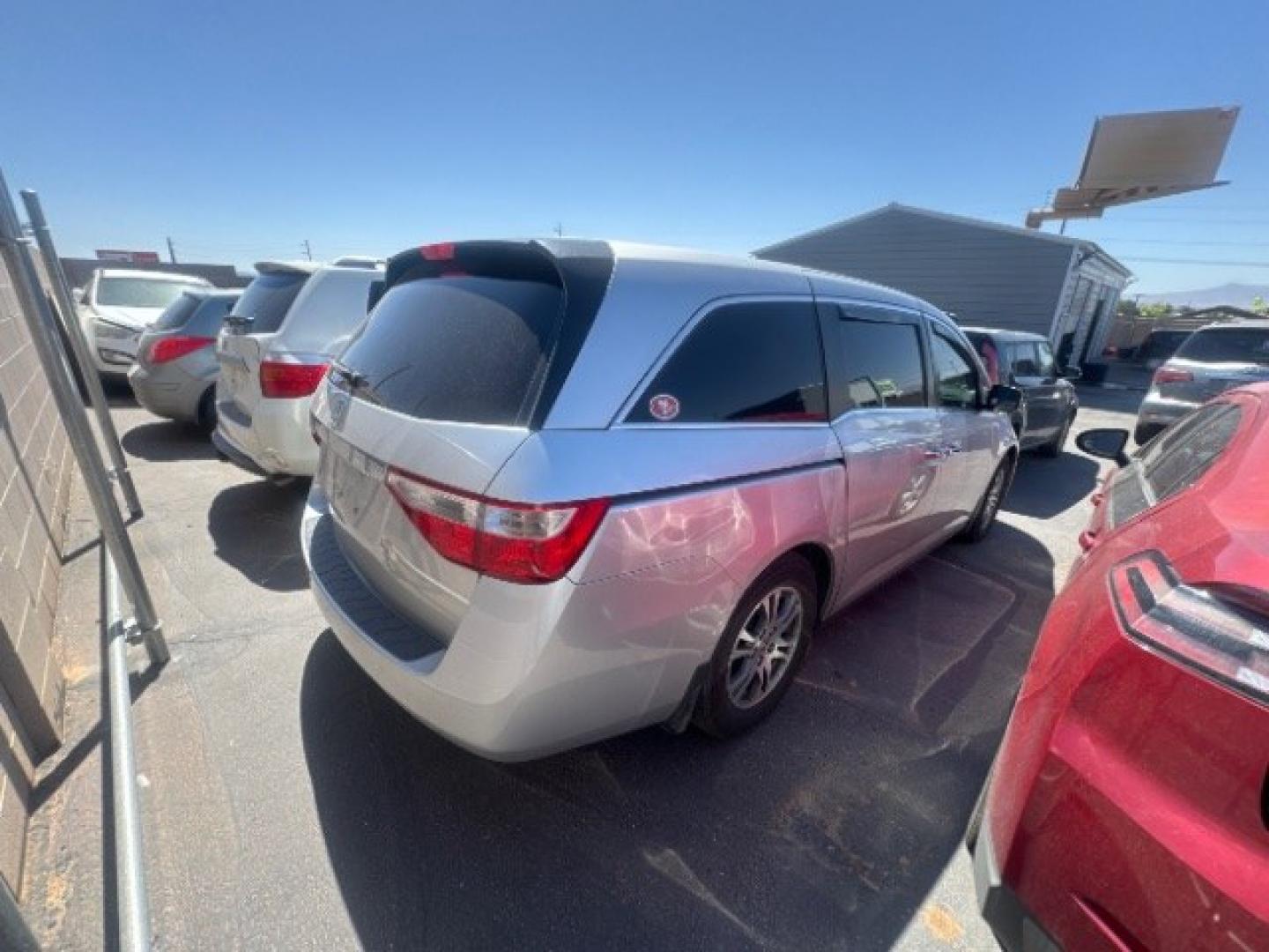 2012 Alabaster Silver Metallic /Gray Honda Odyssey EX-L (5FNRL5H6XCB) with an 3.5L V-6 i-VTEC variable valve control engine, Automatic transmission, located at 1865 East Red Hills Pkwy, St. George, 84770, (435) 628-0023, 37.120850, -113.543640 - This vehicle is a Mechanic Special. This means it will need some love. Runs a drives fine but has body damage, leaks or other mechanical issues. It did NOT pass our 50 point inspection. Get a great deal on a less than perfect car. These cars do NOT qualify for our in house financing. Cash and carry,- Photo#5