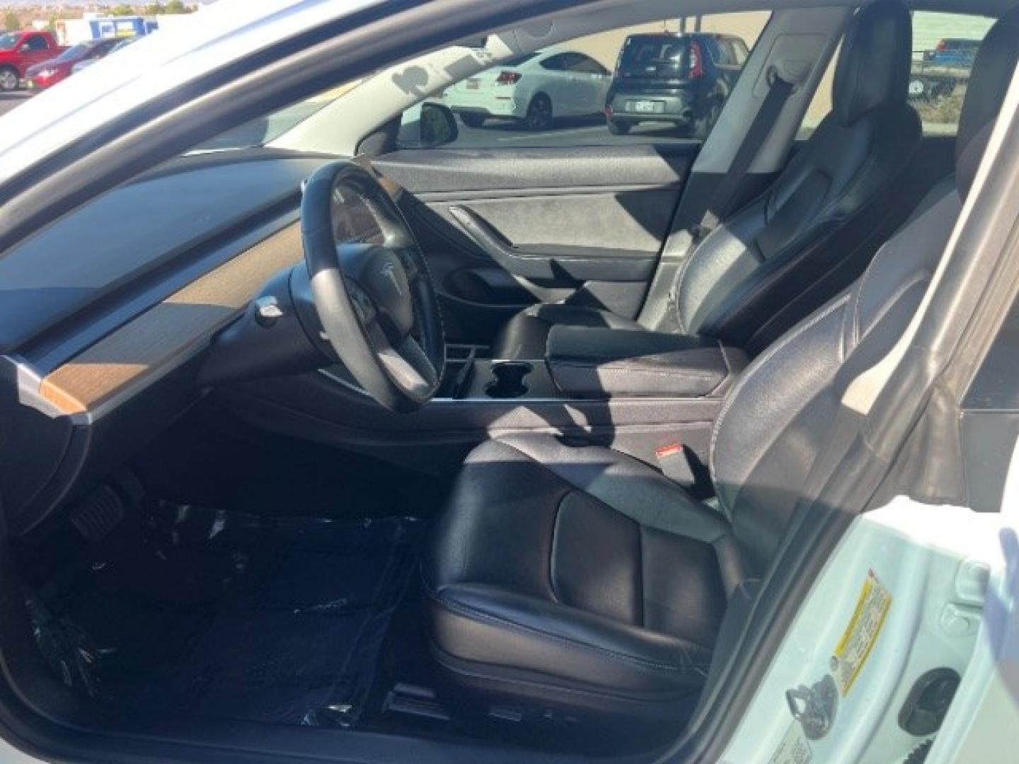 2019 Pearl White Multi-Coat /Black Tesla Model 3 Long Range (5YJ3E1EA3KF) with an ELECTRIC engine, Electric transmission, located at 1865 East Red Hills Pkwy, St. George, 84770, (435) 628-0023, 37.120850, -113.543640 - Excellent Tesla Model 3 Long Range All Wheel Drive. 5 Seats HW3. Small scratches and dings as pictured. Every Tesla we sell has had cabin air filter replaced, radiator cleaned, fluids topped AND comes with a mobile charging kit! Battery is healthy and gets 330 on full charge!!! ReCurrent report Ex- Photo#16
