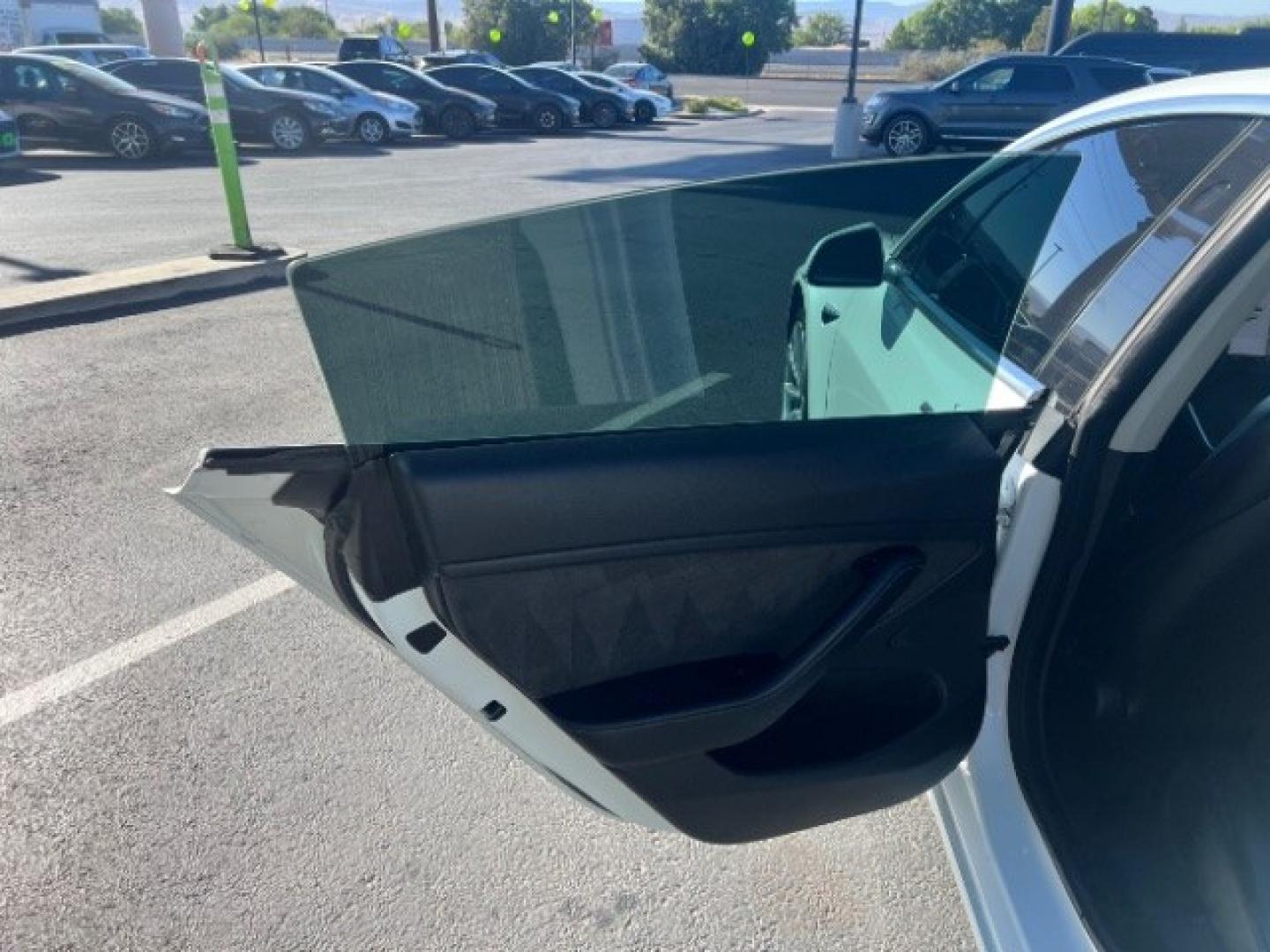 2019 Pearl White Multi-Coat /Black Tesla Model 3 Long Range (5YJ3E1EA3KF) with an ELECTRIC engine, Electric transmission, located at 1865 East Red Hills Pkwy, St. George, 84770, (435) 628-0023, 37.120850, -113.543640 - Excellent Tesla Model 3 Long Range All Wheel Drive. 5 Seats HW3. Small scratches and dings as pictured. Every Tesla we sell has had cabin air filter replaced, radiator cleaned, fluids topped AND comes with a mobile charging kit! Battery is healthy and gets 330 on full charge!!! ReCurrent report Ex- Photo#20