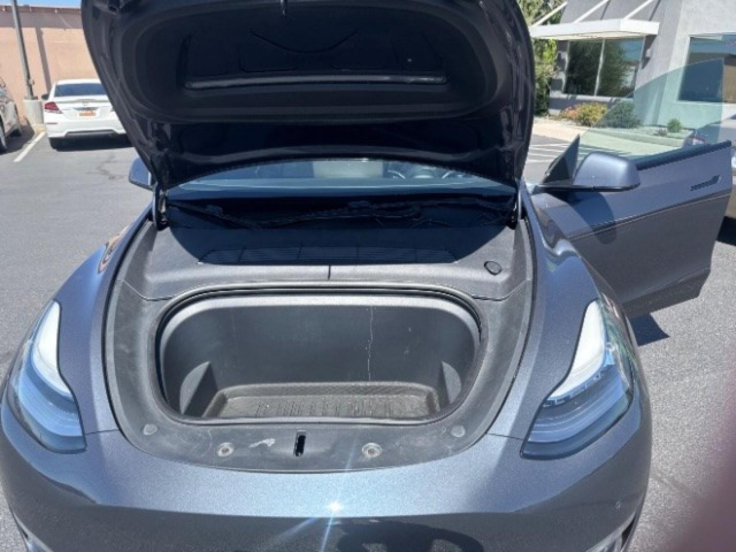 2020 Midnight Silver Metallic /Black Tesla Model Y Long Range Dual Motor All-Wheel Drive (5YJYGDEEXLF) with an ELECTRIC engine, AUTOMATIC transmission, located at 1865 East Red Hills Pkwy, St. George, 84770, (435) 628-0023, 37.120850, -113.543640 - Excellent Tesla Model Y Long Range All Wheel Drive, 5 Seats HW3, Interior and exterior in great condition. Small scratches and dings as pictured. Every Tesla we sell has had cabin air filter replaced, radiator cleaned, fluids topped AND comes with a mobile charging kit! Battery is healthy and gets- Photo#23