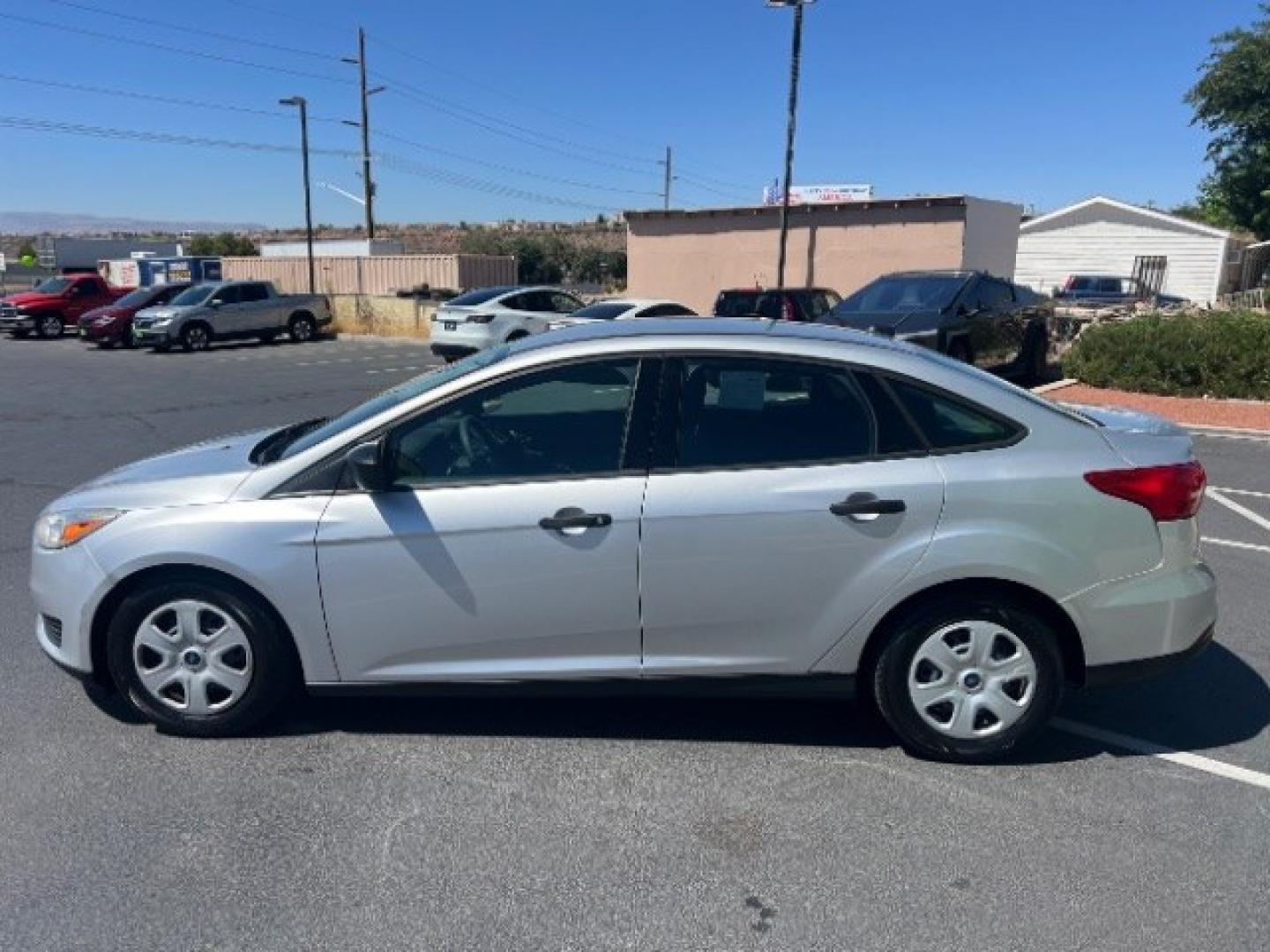 2017 Ingot Silver Metallic /Charcoal Black Ford Focus S (1FADP3E29HL) with an 2L I-4 gasoline direct injection engine, Automatic transmission, located at 940 North Main Street, Cedar City, UT, 84720, (435) 628-0023, 37.692936, -113.061897 - We specialize in helping ALL people get the best financing available. No matter your credit score, good, bad or none we can get you an amazing rate. Had a bankruptcy, divorce, or repossessions? We give you the green light to get your credit back on the road. Low down and affordable payments that fit- Photo#3