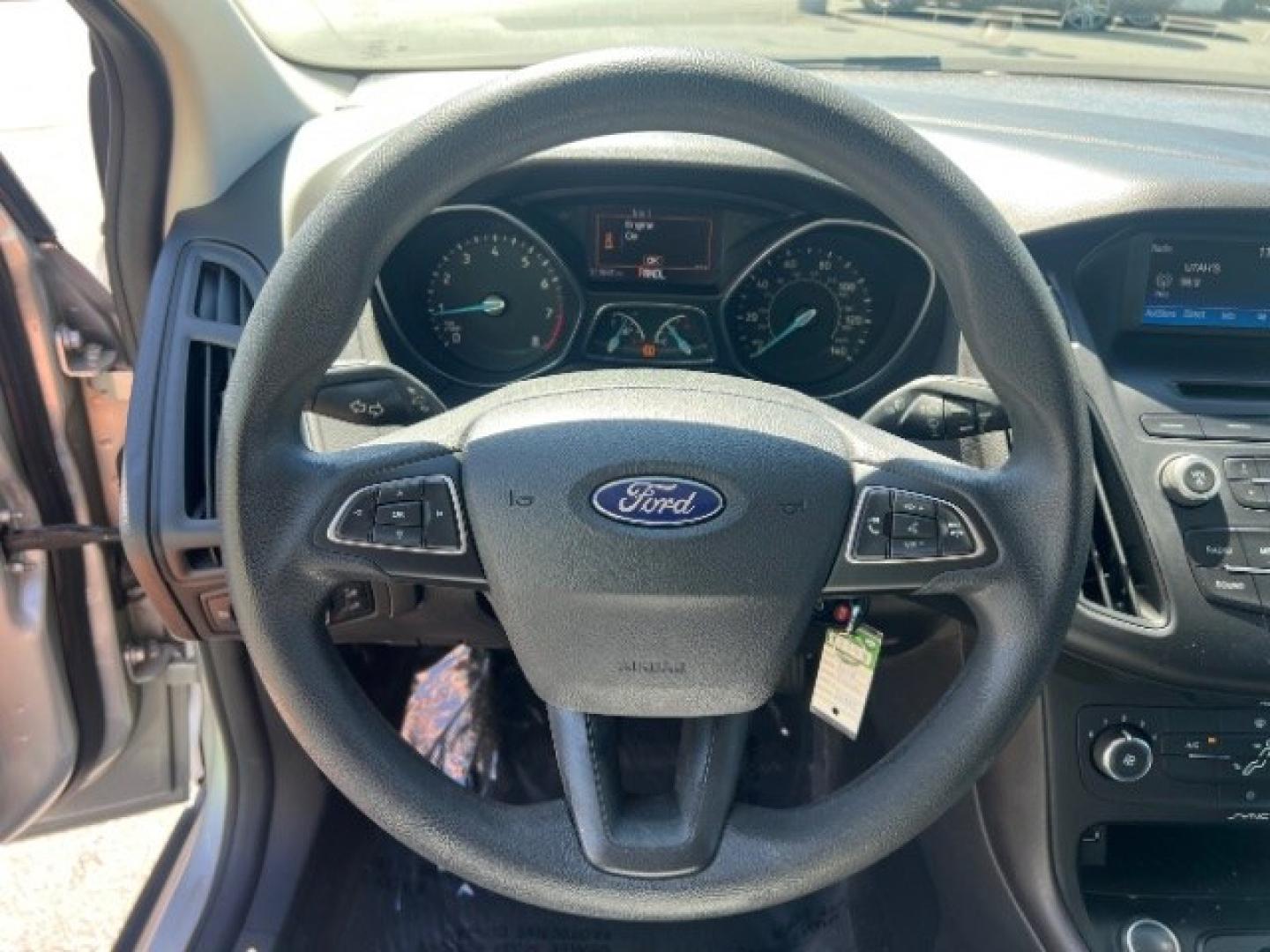 2017 Ingot Silver Metallic /Charcoal Black Ford Focus S (1FADP3E29HL) with an 2L I-4 gasoline direct injection engine, Automatic transmission, located at 940 North Main Street, Cedar City, UT, 84720, (435) 628-0023, 37.692936, -113.061897 - We specialize in helping ALL people get the best financing available. No matter your credit score, good, bad or none we can get you an amazing rate. Had a bankruptcy, divorce, or repossessions? We give you the green light to get your credit back on the road. Low down and affordable payments that fit- Photo#15
