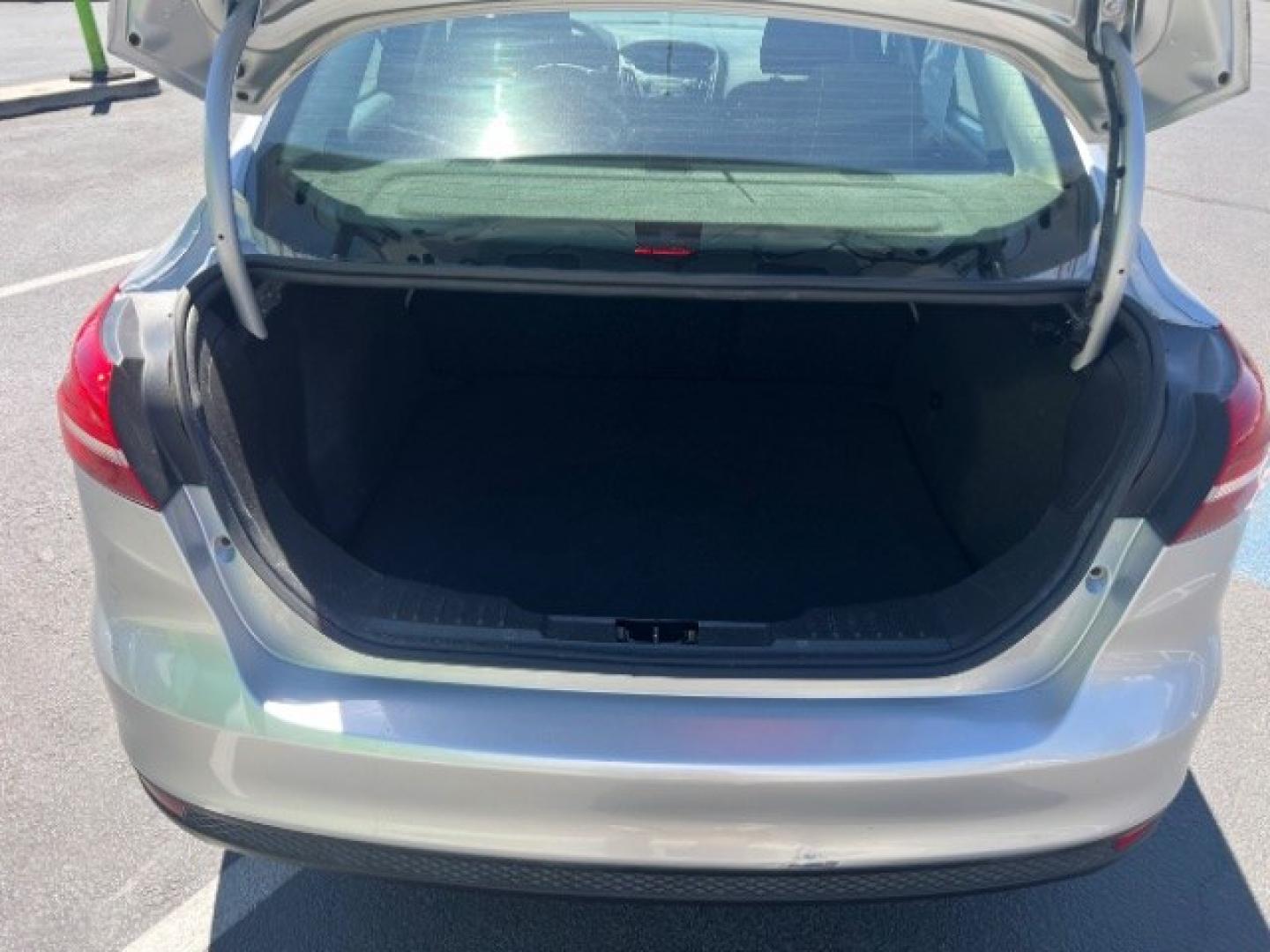 2017 Ingot Silver Metallic /Charcoal Black Ford Focus S (1FADP3E29HL) with an 2L I-4 gasoline direct injection engine, Automatic transmission, located at 940 North Main Street, Cedar City, UT, 84720, (435) 628-0023, 37.692936, -113.061897 - We specialize in helping ALL people get the best financing available. No matter your credit score, good, bad or none we can get you an amazing rate. Had a bankruptcy, divorce, or repossessions? We give you the green light to get your credit back on the road. Low down and affordable payments that fit- Photo#22